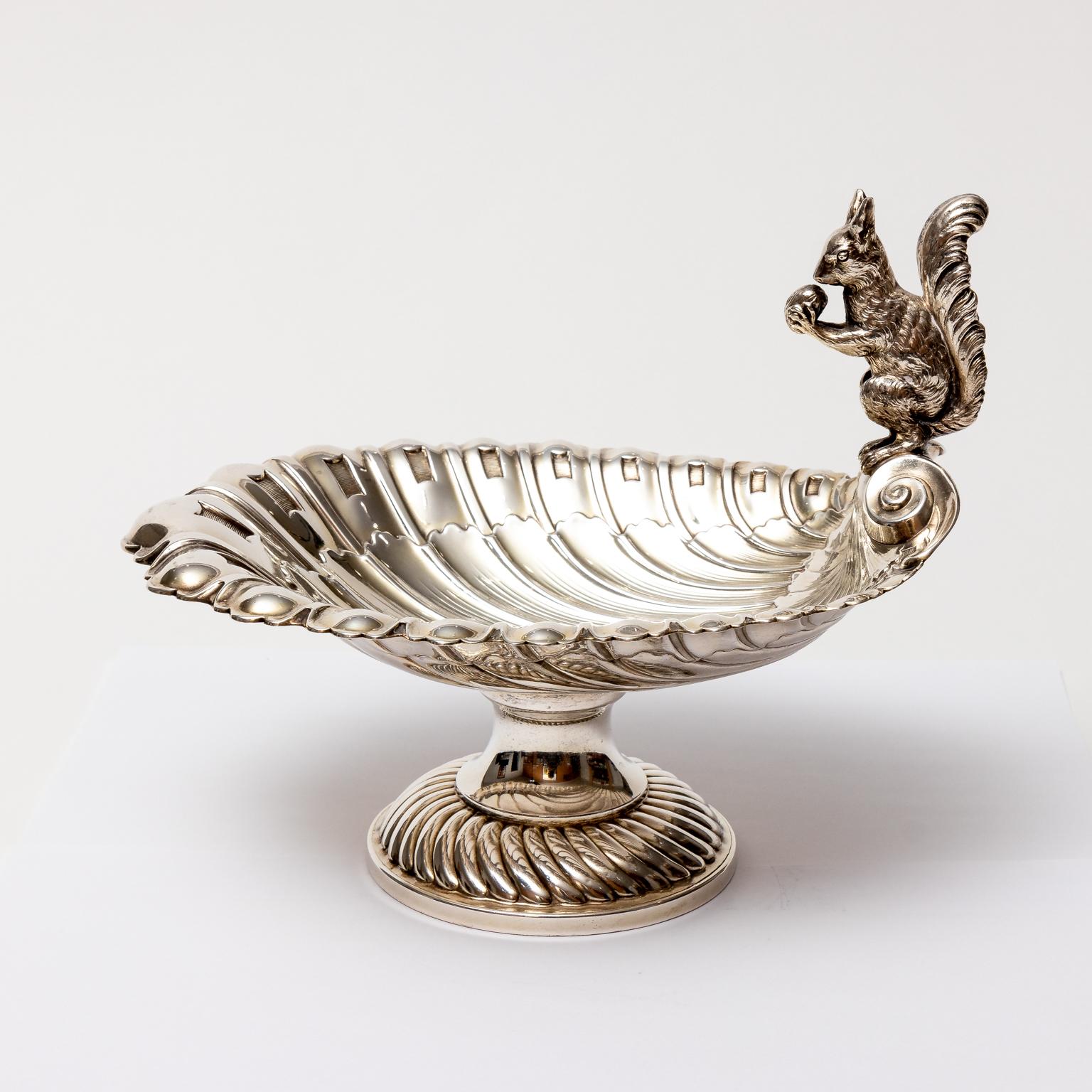 Circa 1900s English silver plate squirrel dish in the Edwardian style on pedestal base with scallop shell. Made in England. Please note of wear consistent with age.