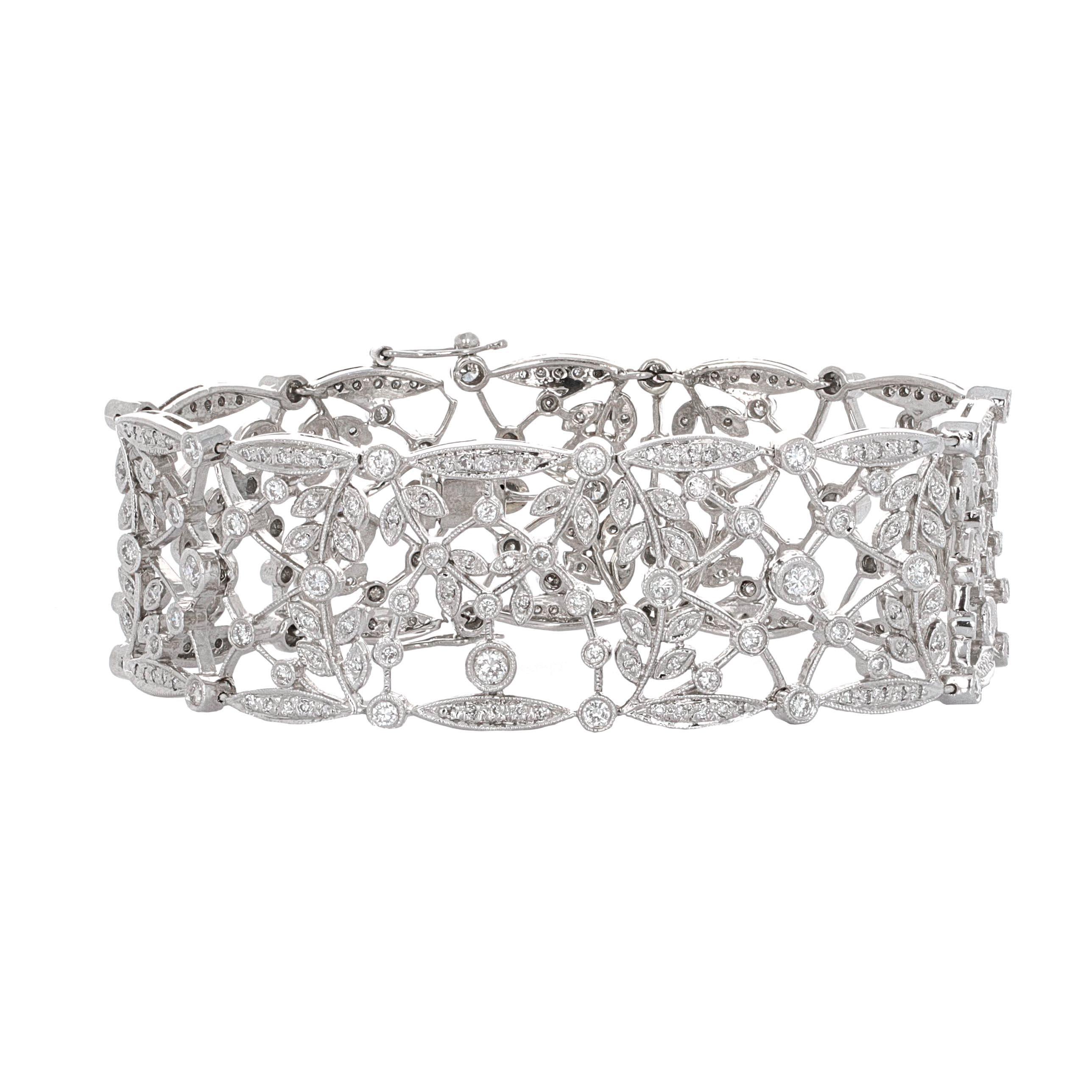 18-karat white gold Edwardian-inspired diamond lace bracelet. The ornate and open lace look creates the Edwardian look from the 1900’s. 
The skill, design, and attention to detail are explicit. On the clasp, there is a safety on both sides. 

The