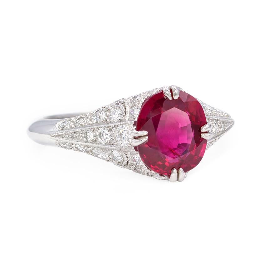 An Edwardian style ring set with an oval ruby in a handmade pavé diamond mounting in platinum.  Mount by Sebastien Barier, France.  Ruby 1.84 ct.  Atw diamonds 1.00 ct. 

Current ring size: US 6 1/2 (Please contact us with re-sizing inquiries.)