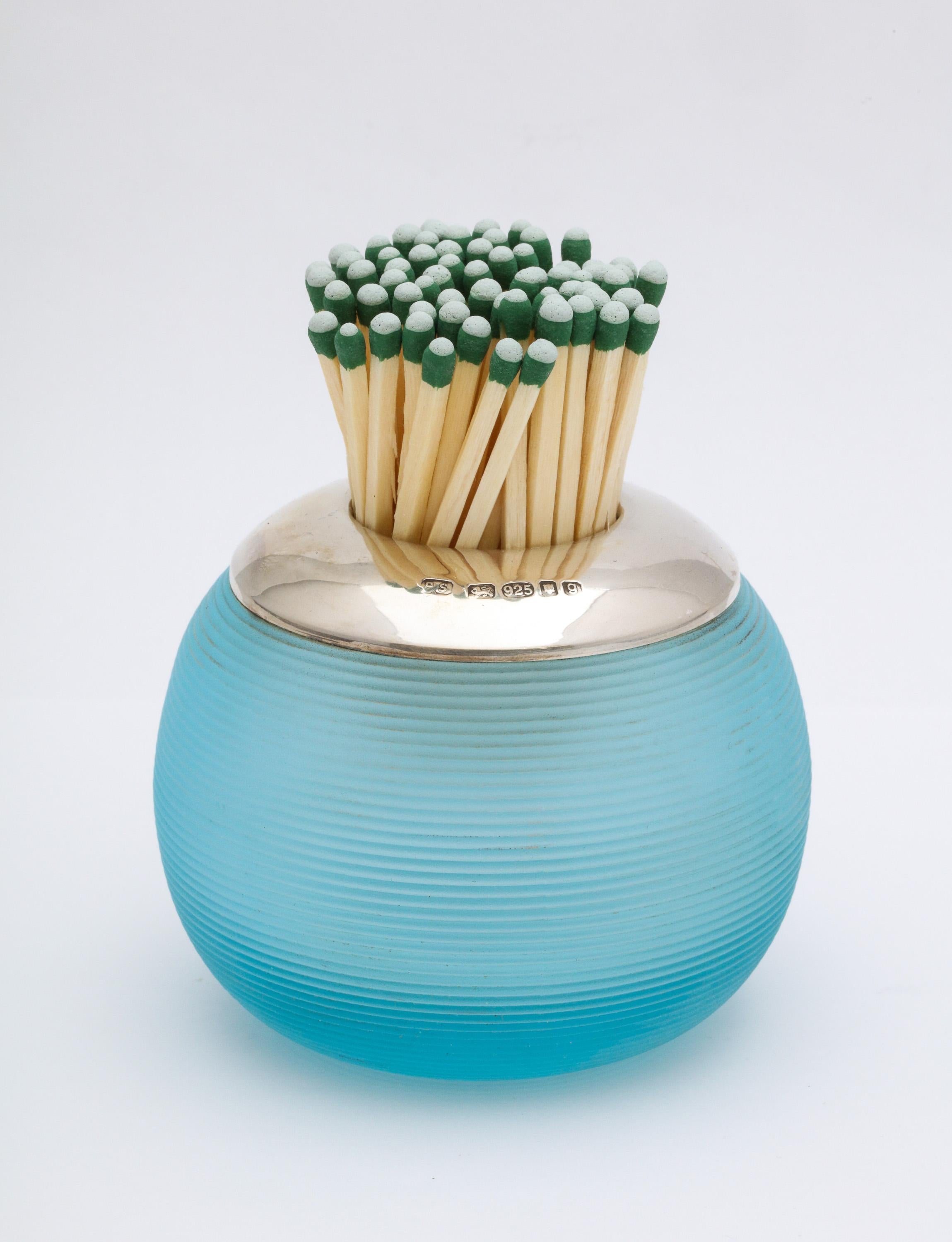 Edwardian-style, sterling silver-mounted, light blue colored threaded crystal match striker, with all sterling silver match cup, London, 1981, Practical Silverware Company - makers. Measures 2 3/4 inches high x 3 inches diameter (at widest point).