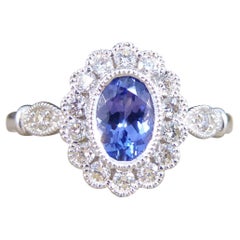 Edwardian Style Tanzanite and Diamond Cluster Ring Mounted in White Gold
