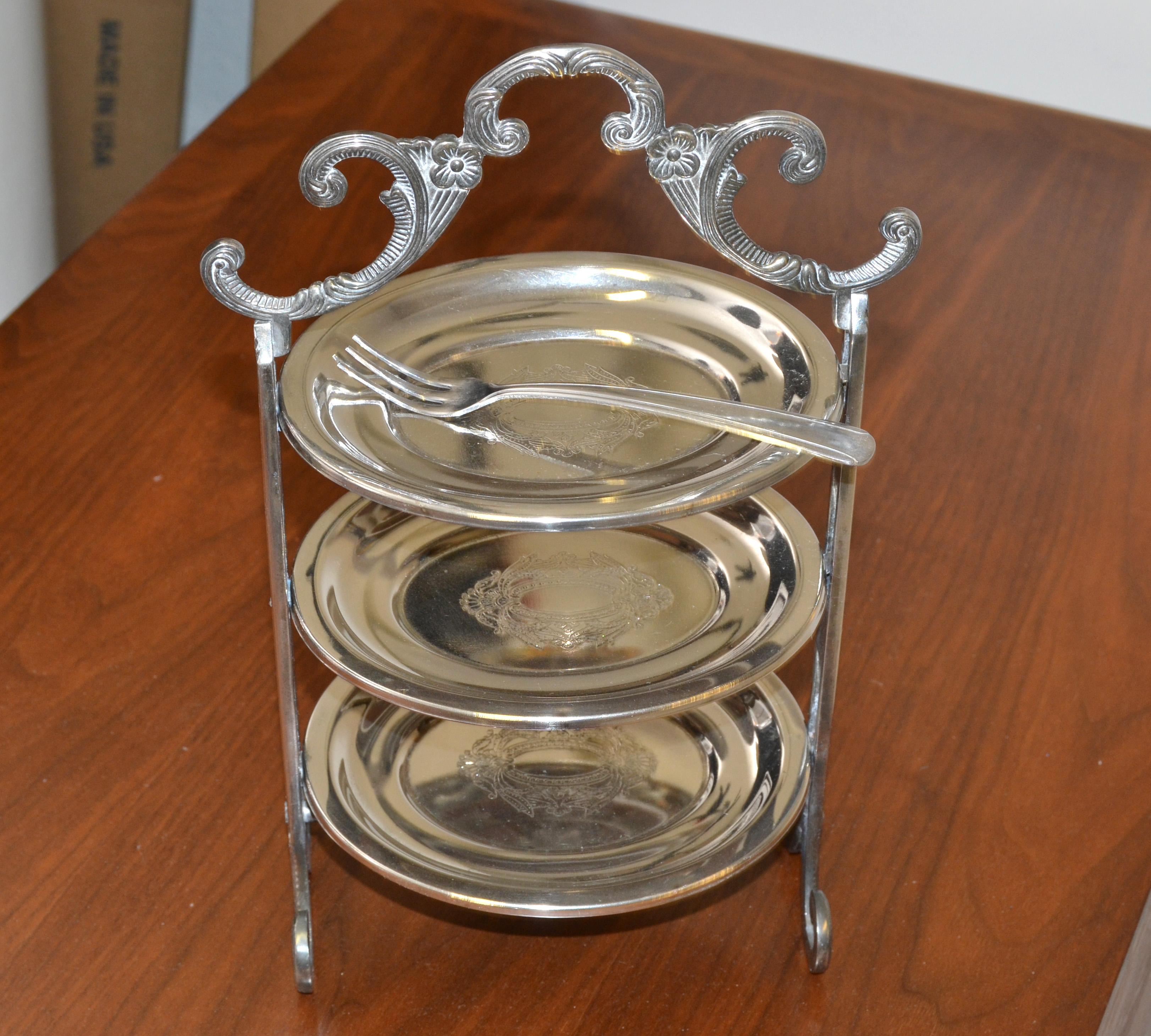 Edwardian Sheffield Silver Company style three-tier silver plated cake stand, patisserie stand or server with silver plated fork.
An item redolent of another age, this cake stand was originally made for afternoon tea, scones, petit fours, lemon