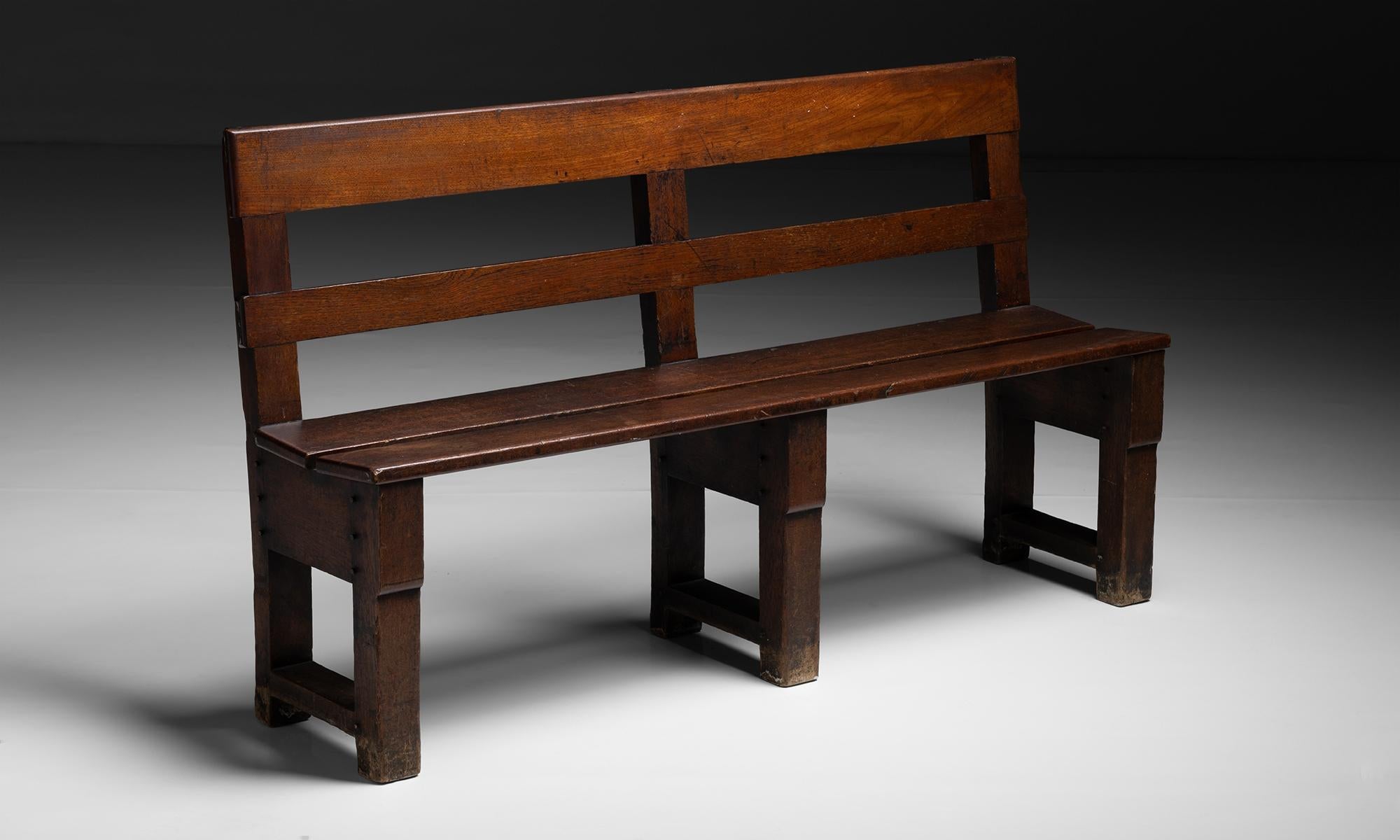 Edwardian Teak Bench

England circa 1900

Well made bench with dowelled construction pegs.

61.5”w x 16.5”d x 35”h x 18