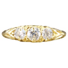 Antique Edwardian Three Stone Diamond Ring with Swirl Gallery in 18 Carat Yellow Gold