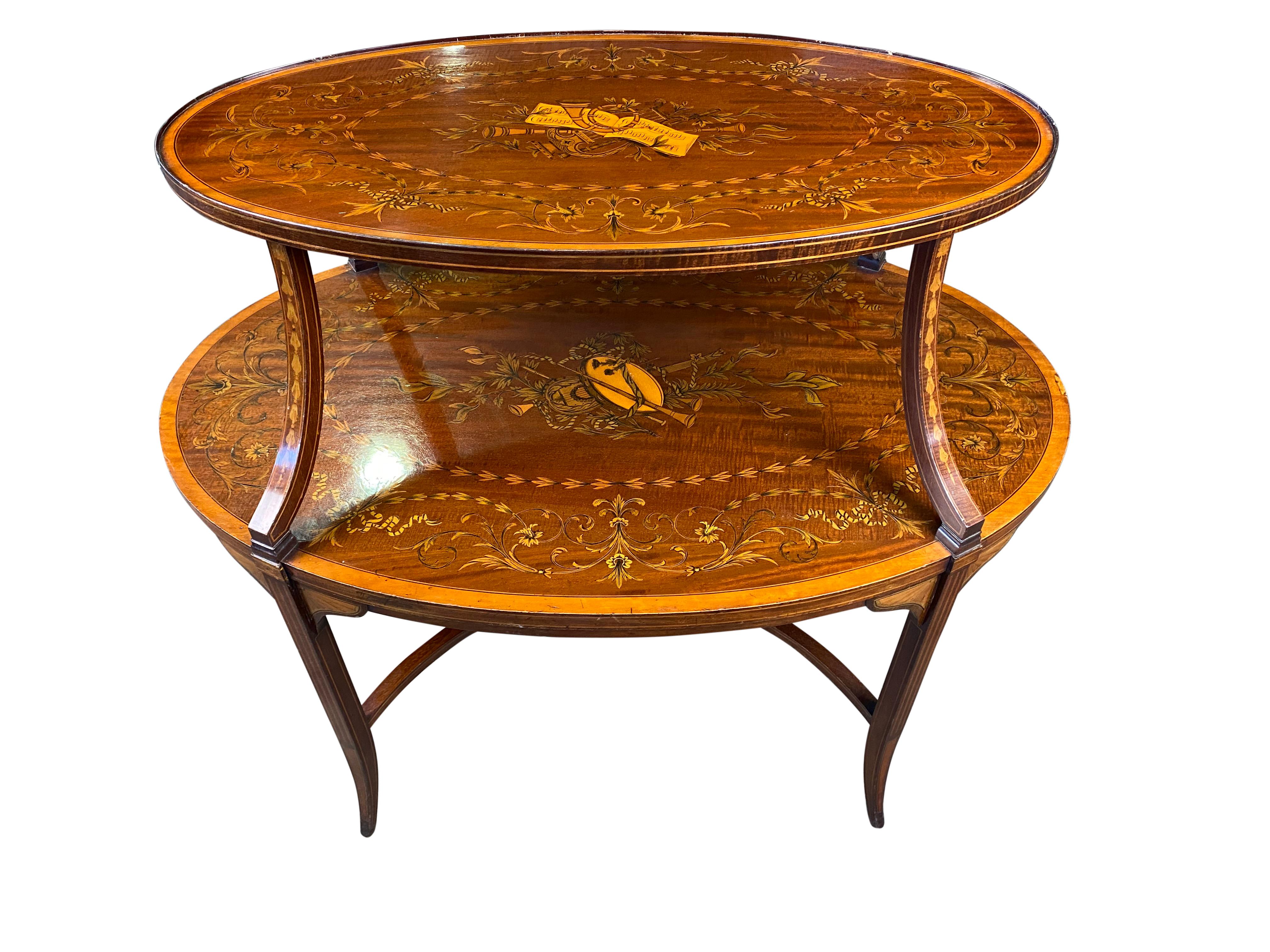 The work and detail to this English étagère is exceptional, not just to the table itself, but the elegant flora pattern inlay the top surfaces. The scenes depict musical instruments. An absolutely stunning craftsmanship. 

Dimensions (cm)
80 H,