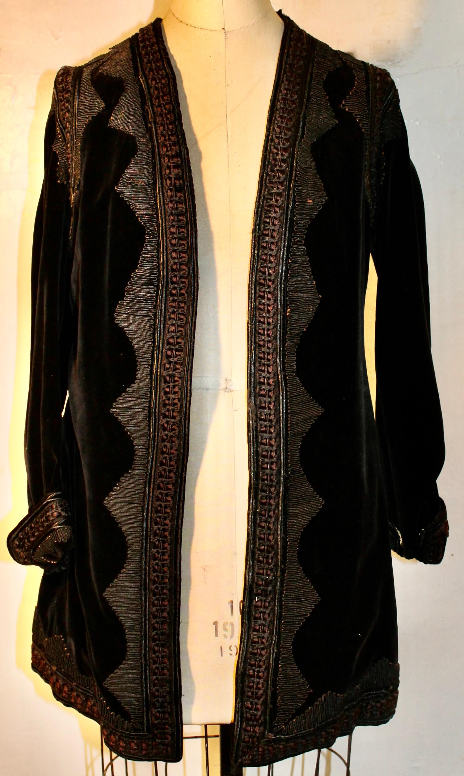 Elegant Black Velvet with Soutache Trimming.  Hand sown moire silk lining. Jacket length 34