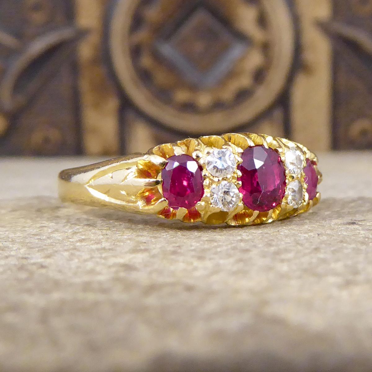 This gorgeous Edwardian ring has been hand crafted with superb coloured stones. With alternating Rubies and old cut Diamonds, this classic ring holds a 0.33ct oval cut Ruby in the centre with a 0.16ct Oval cut Ruby on either end divided by two