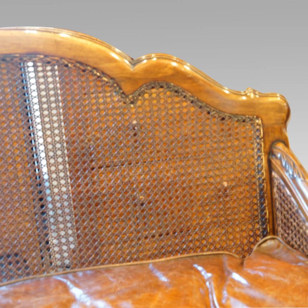 20th Century Edwardian Walnut and Leather Bergere Sofa