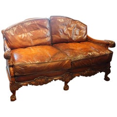 Edwardian Walnut and Leather Bergere Sofa