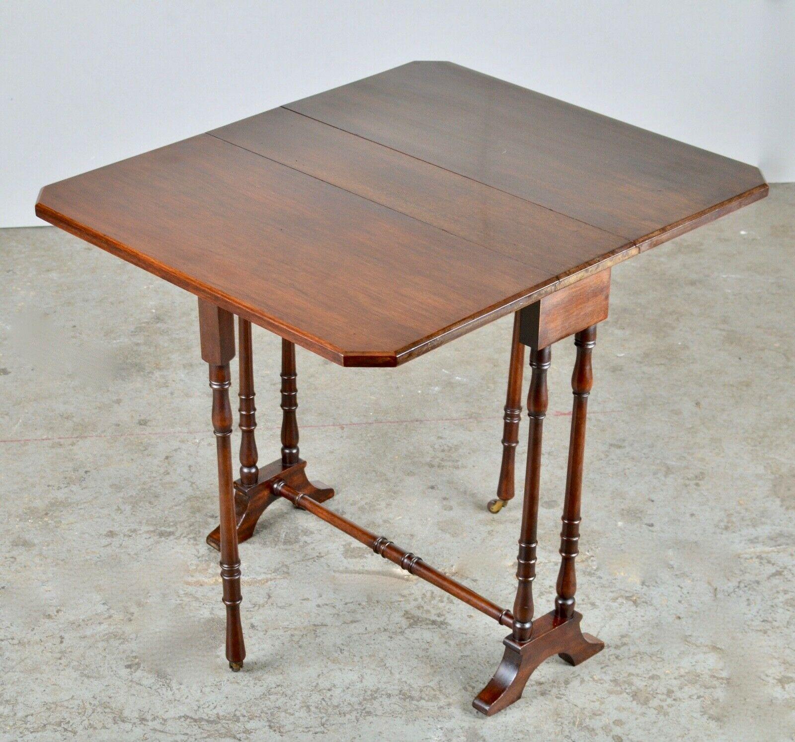 We are delighted to offer for sale this Edwardian walnut drop leaf sutherland occasional table. This table would be ideal for small places with canted corners, 
slightly turned supports, and stretchers with castors on extended legs. The table is in