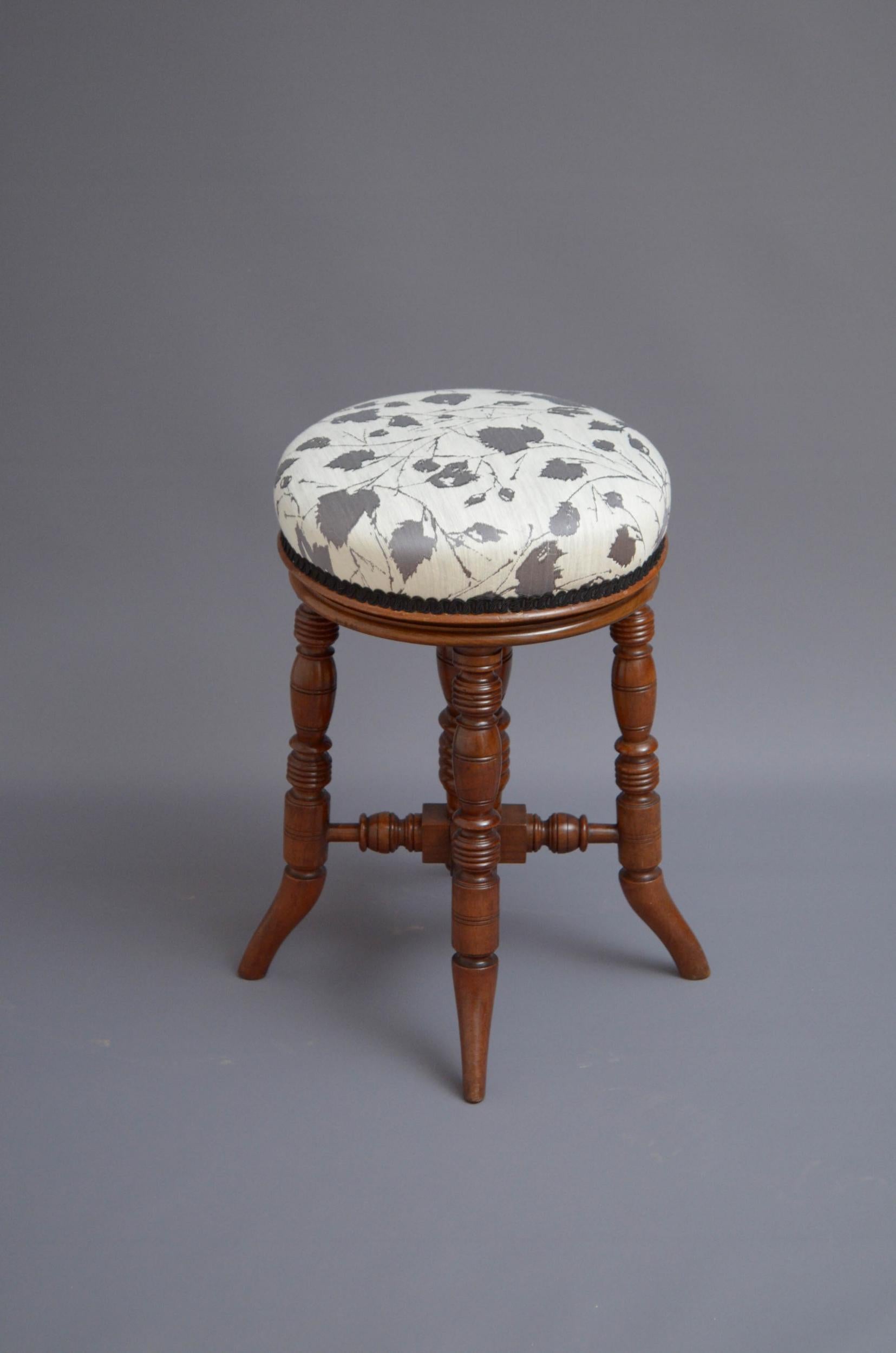 Sn4907 Edwardian piano or dressing table stool in walnut, having height adjustable seat and four turned and ringed outswept legs united by cross stretchers. This antique stool has been sympathetically restored and is ready to use at home, circa