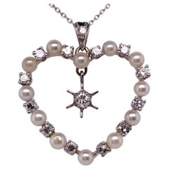 Edwardian White Gold Diamond and Pearl Heart Pendant