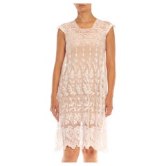 Robe de poupée sans manches en dentelle blanche de style édouardien