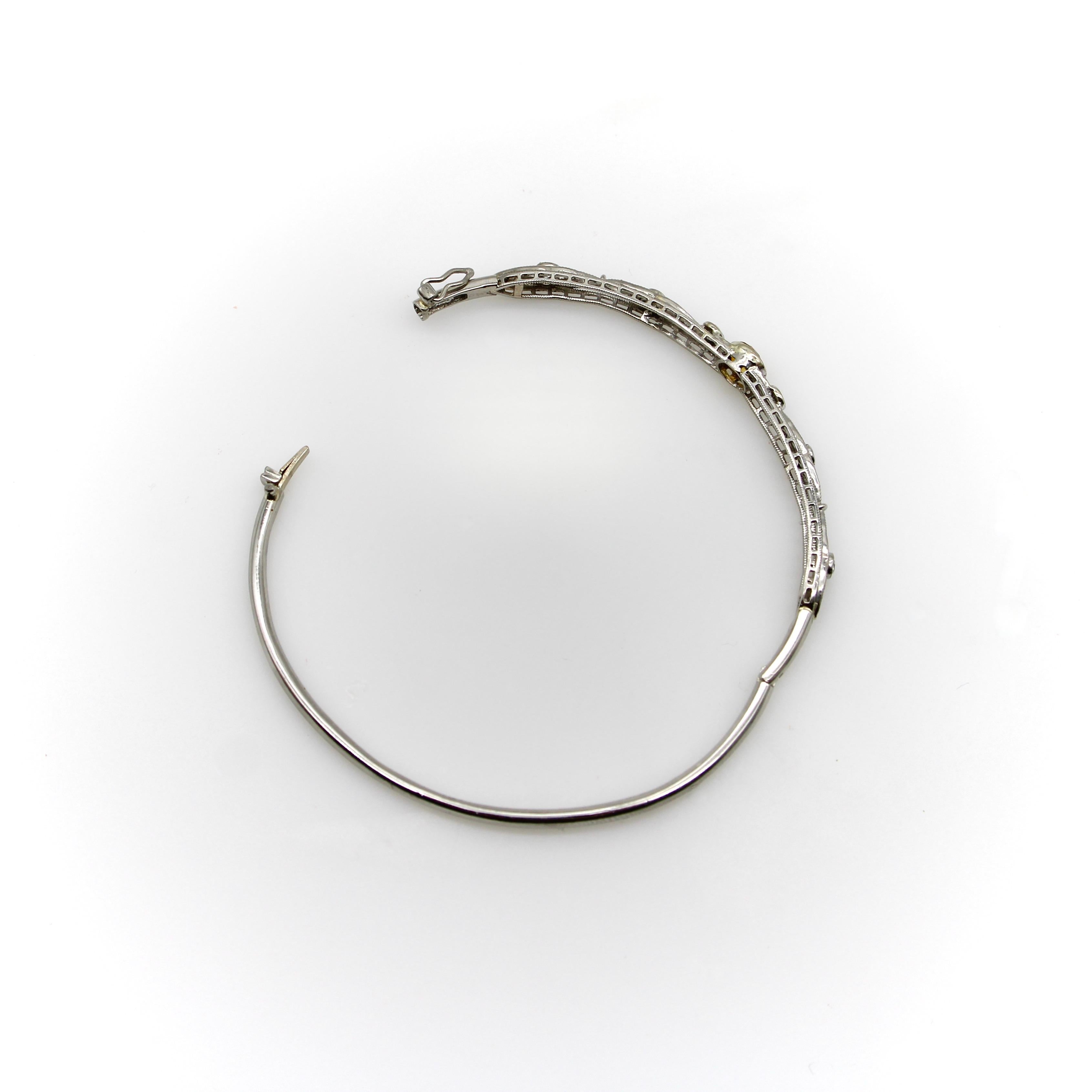One of our favorite things to do here at Kirsten’s Corner is find bar pins from the Edwardian and Art Deco eras and have our jeweler gently bend them into beautiful bangles. This piece began as a platinum brooch with an orange-yellow saturated