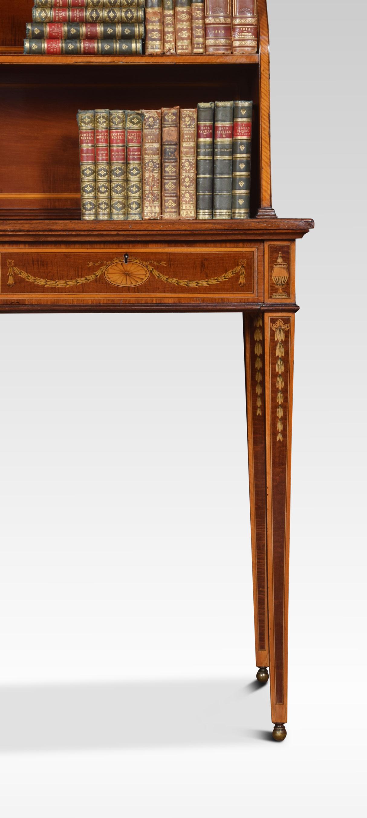 Mahogany and satinwood inlaid writing table by Edwards & Roberts, the raised back with two shelves over an inlaid top with floral scroll decoration. To the frieze fitted with two drawers one drawer having the makers mark all raised up on bellflower