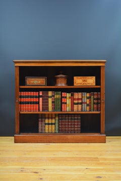 Libreria a giorno di Edward & Roberts, noce c1880