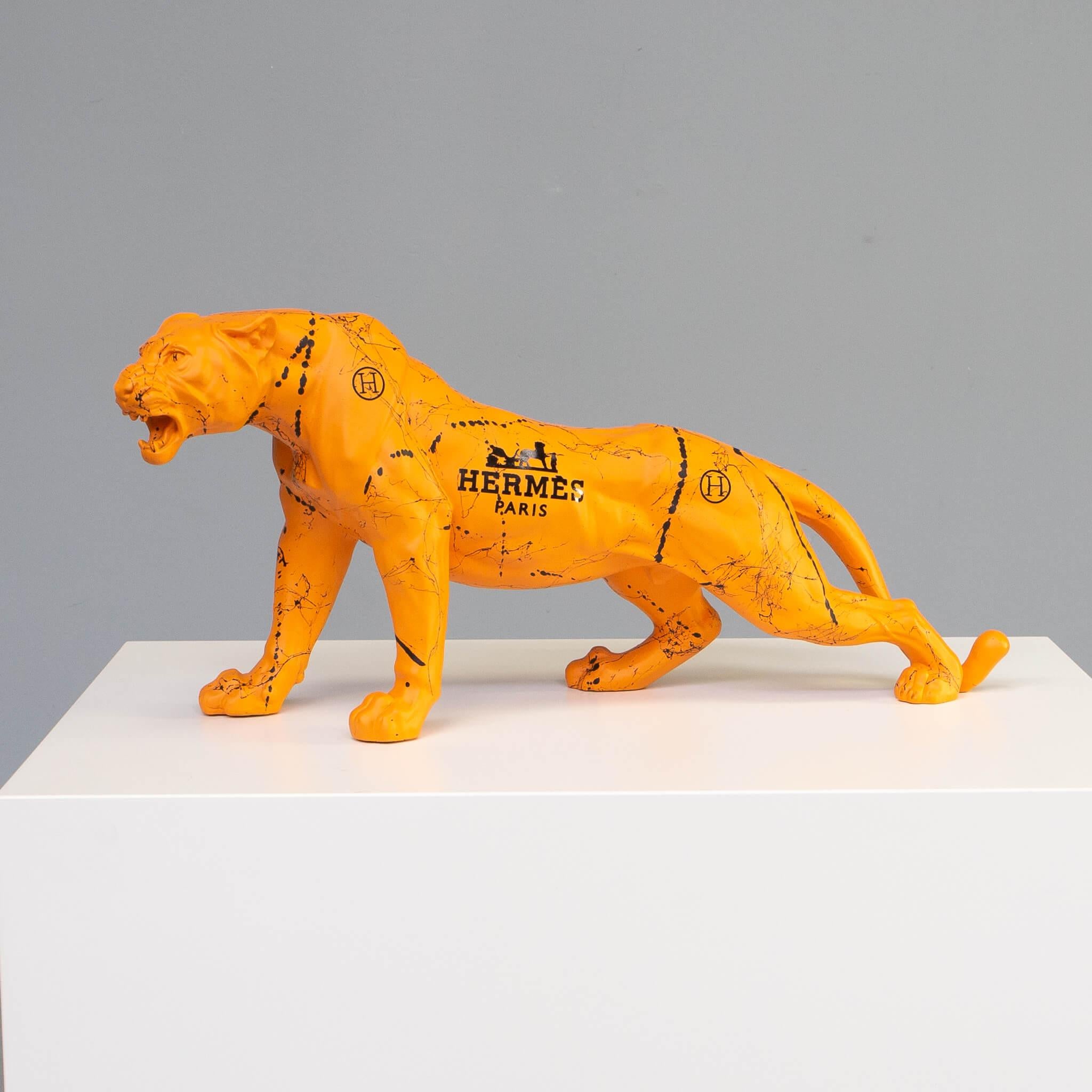 This resin sculpture was created to give style and luxury to your room. The high quality spray paint gives the feline an extraordinary look. It was finished with a layer of Mat warnish. Made by Edwart for Hermes. Only 10 pieces made, this is number