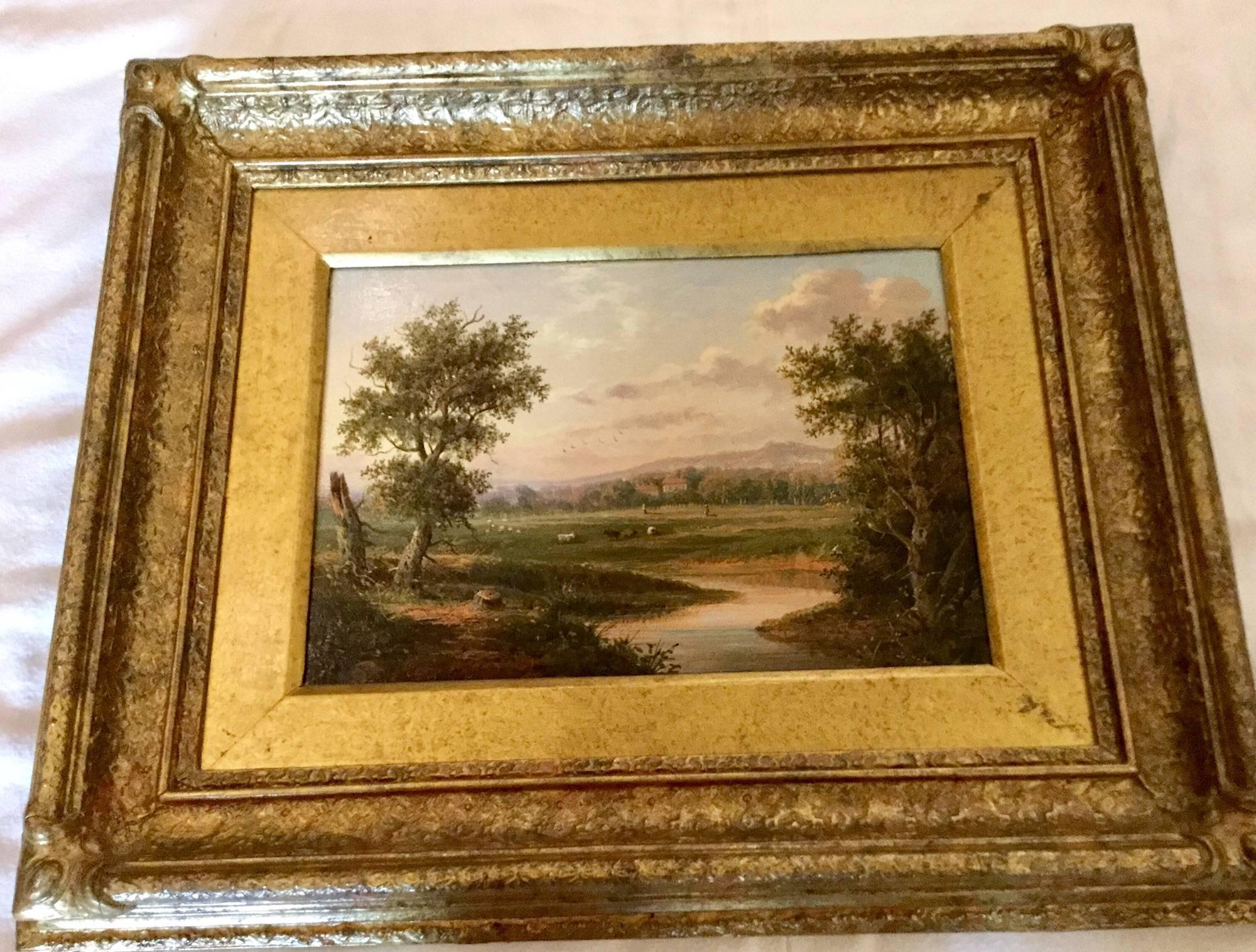 An English River Landscape by EDWIN BUTTERY (1839-1908)
 Oil on canvas.
Total size including picture and frame: 35cm x 43cm x 6cm
Clearly signed and dated 1869

A Nineteenth Century British landscape artist.  Buttery painted the tranquil and