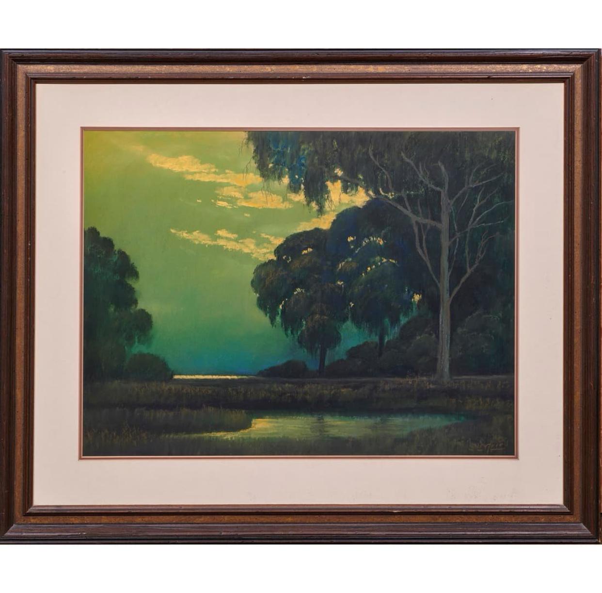 Moody pastel on paper by Edwin C. Siegfried, one of the top Pastelists of this period. This piece is titled “Moonlit Marsh”. Framed in a walnut stained wood with parcel gilt details. An antique white matte all under glass. The sight measurements are