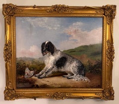 Retrato inglés del siglo XIX de un perro, Spaniel con ave de caza en un paisaje