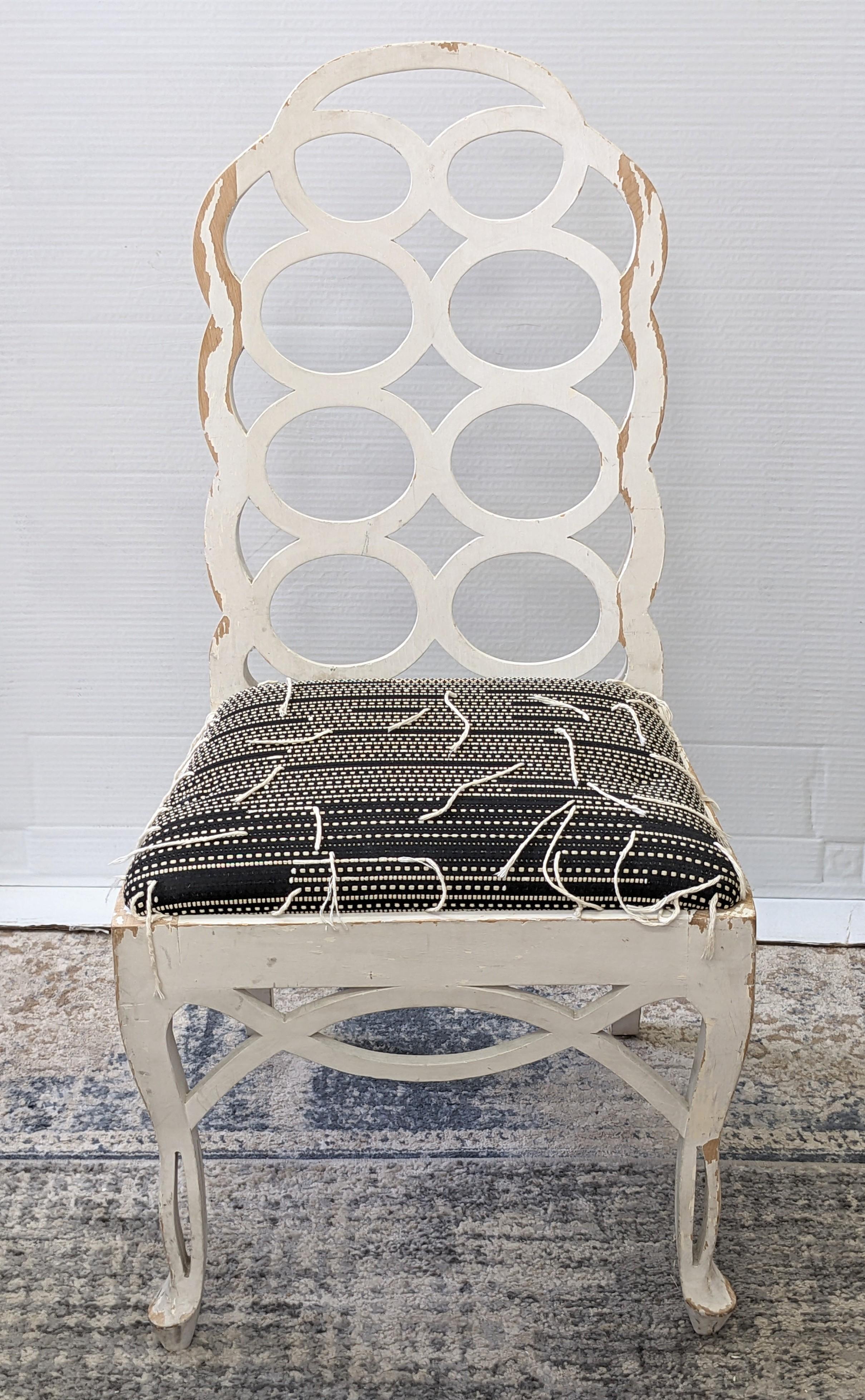Classic Lutyens Style Chair in original finish with unusual seat upholstery. Iconic pierced loop back design back and feet. Original finish has paint losses and can be easily restored. Seat textile originally was a black-white cotton dotted stripe