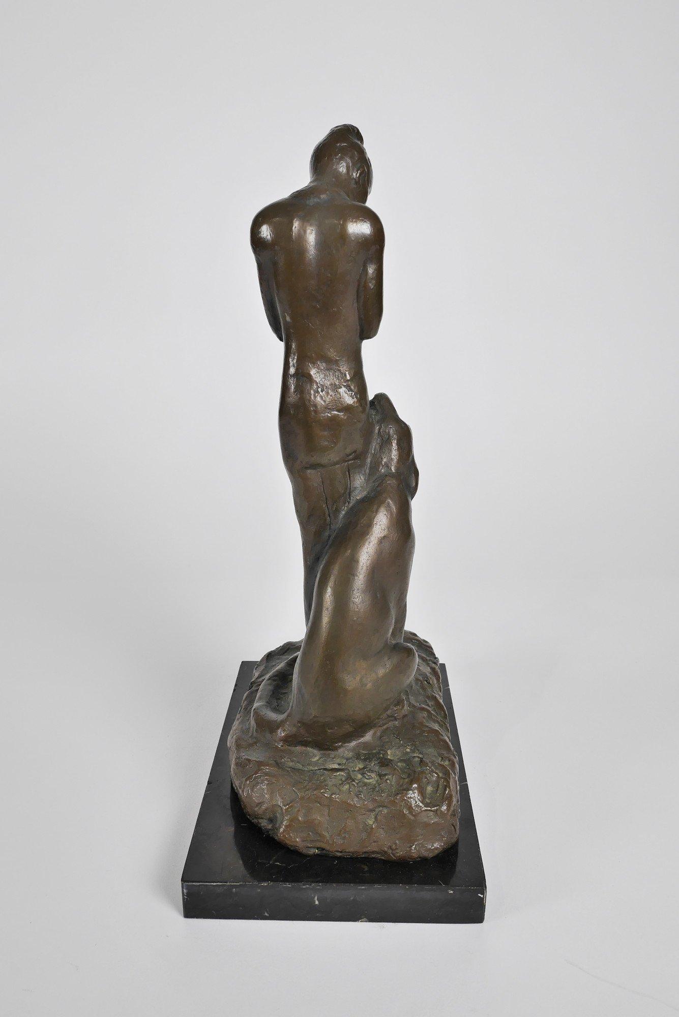 Edwin Willard Deming (American, 1860-1942)
Man with Flute and Cougar
Cast bronze sculpture with golden brown patina 
Signed, numbered 9/100, with Fenn Foundry mark
15 ½ x 9 x 6 inches including marble base. 

Born in Ashland, Ohio, Edwin Deming was