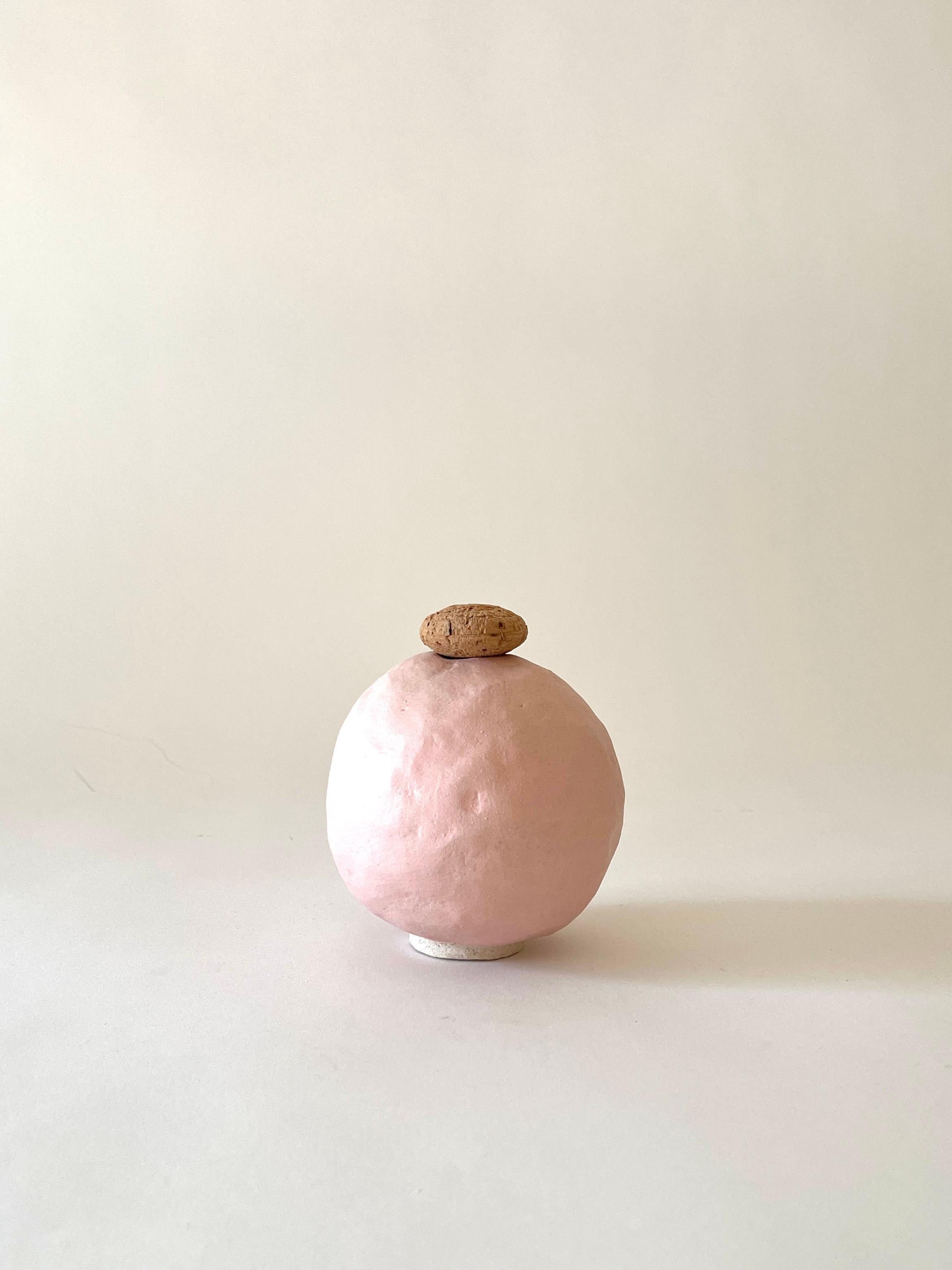 Edwina pink vase by Meg Morrison
One of a kind.
Materials: Ceramic, cork.
Dimensions: Ø 10 x H 13 cm.

All sizes are approximate. Although vases are watertight condensation may form on the bottom. Please protect delicate surfaces.

Meg