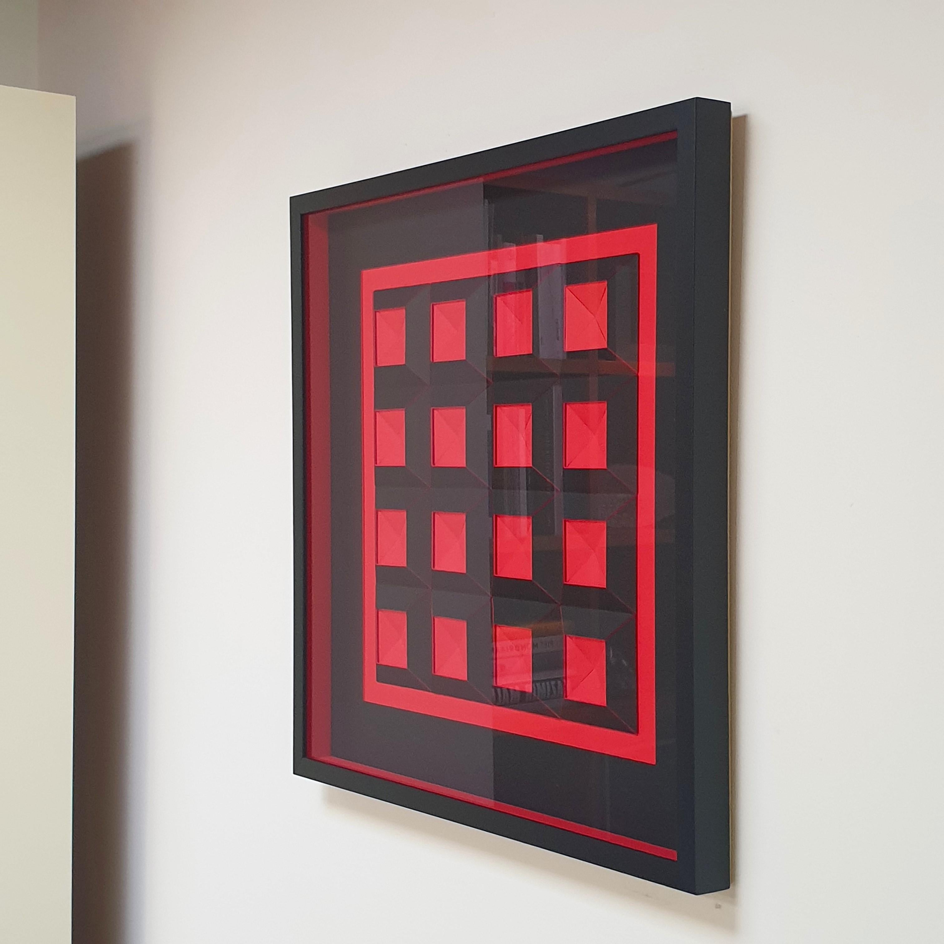 16 red/black quadrants RZ is a unique one-of-a-kind contemporary modern painting relief by Dutch artist Eef de Graaf. The relief is made from meticulously hand-cut plain black and red cardboard elements that are hand-mounted together forming sixteen