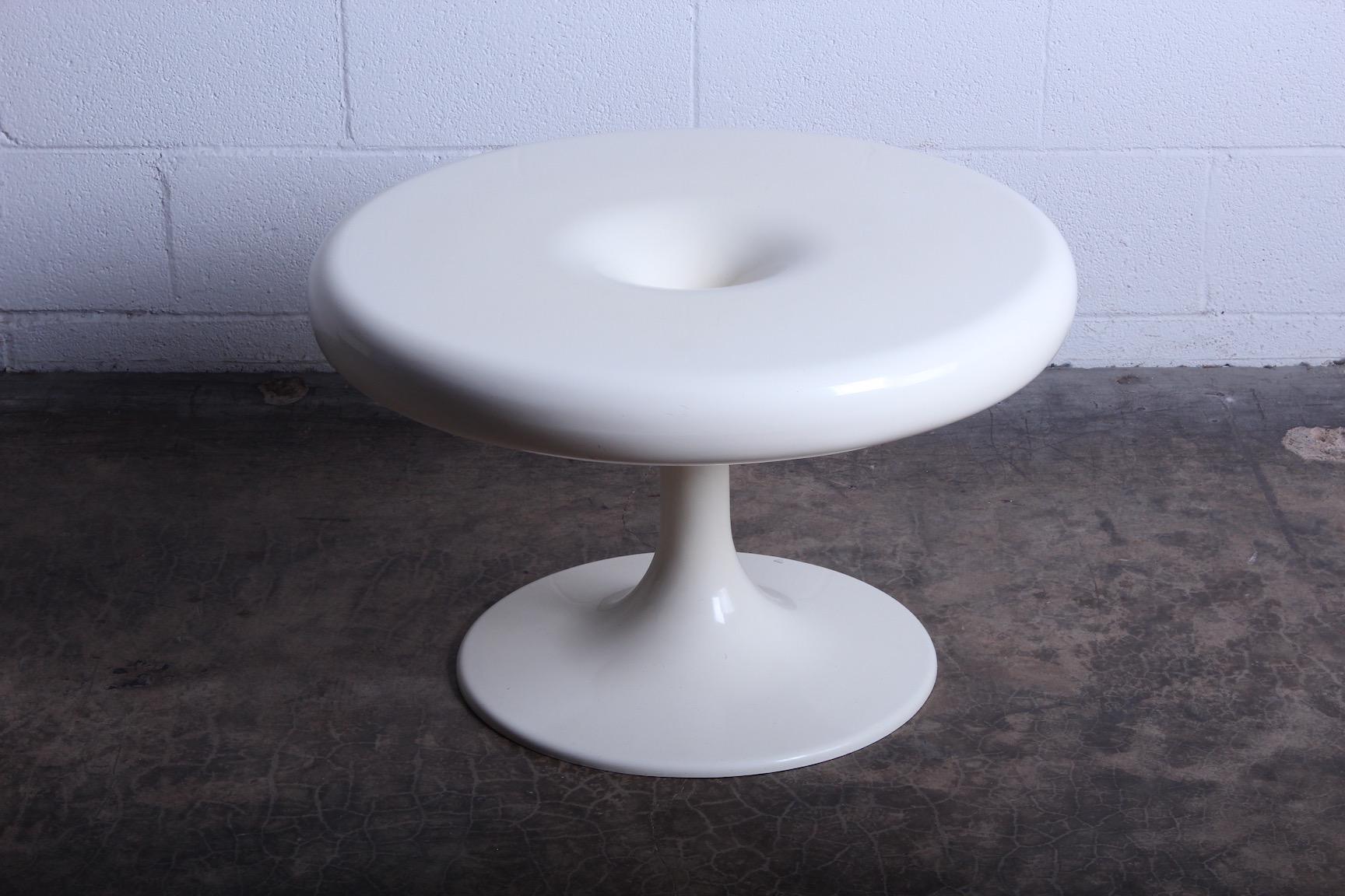 An early white fiberglass 'Kantarelli' side table by Eero Aarnio.