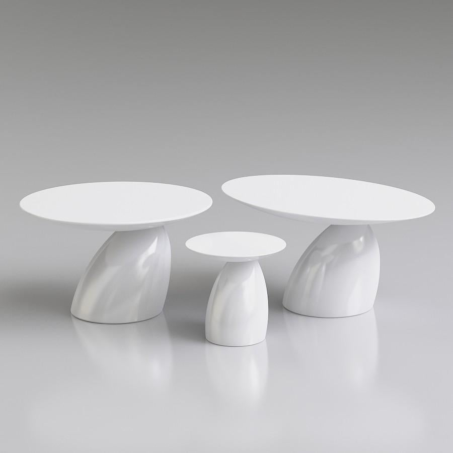 The Parabel was designed in 1993 by Eero Aarnio, and first shown at the International Furniture Fair in Cologne, Germany in January 2002. The table is made of fibreglass and comes in three sizes; small, large and oval. It is only available in white,