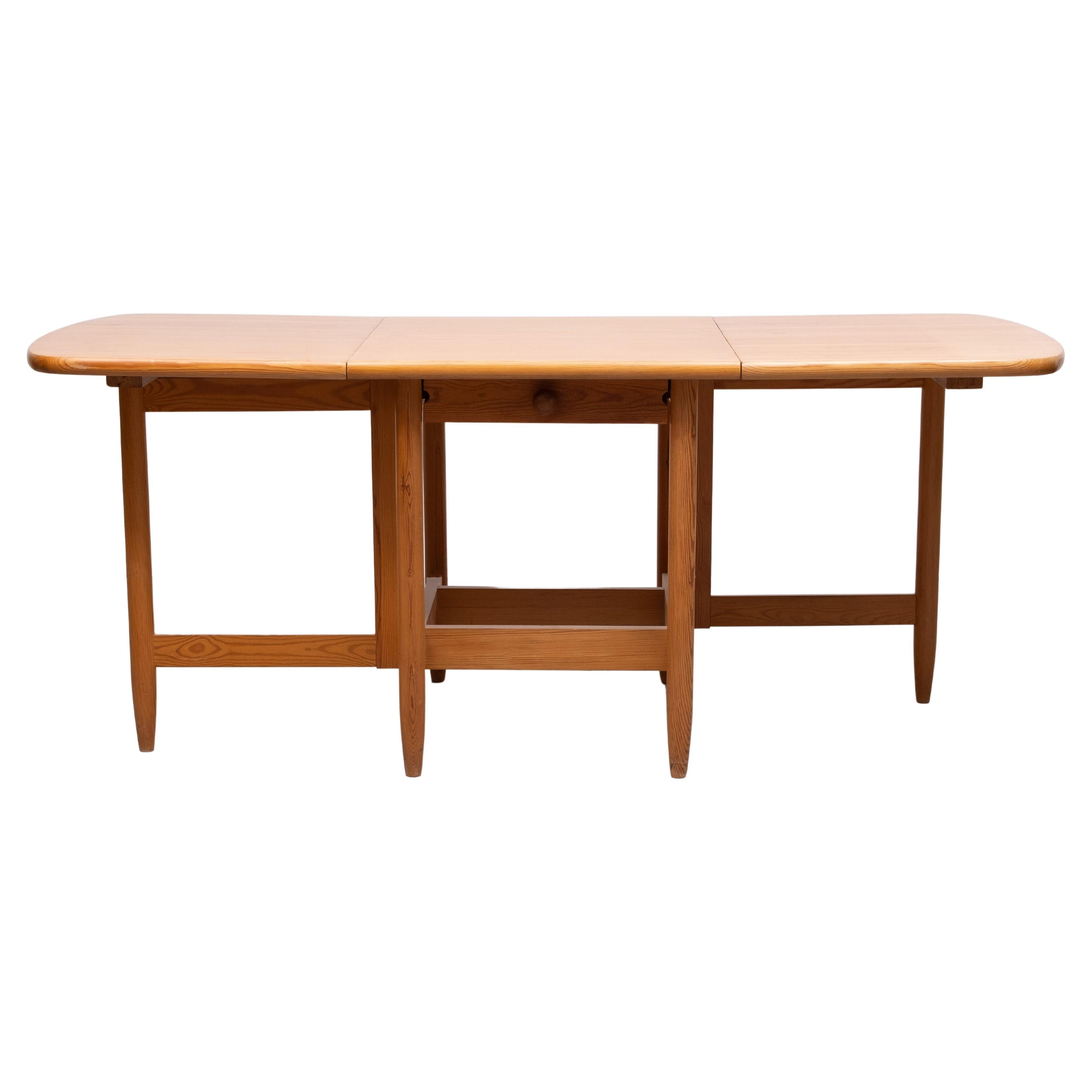 Eero Aarnio  Mesa de comedor abatible de madera maciza de pino  Laukaan Puu Años 70