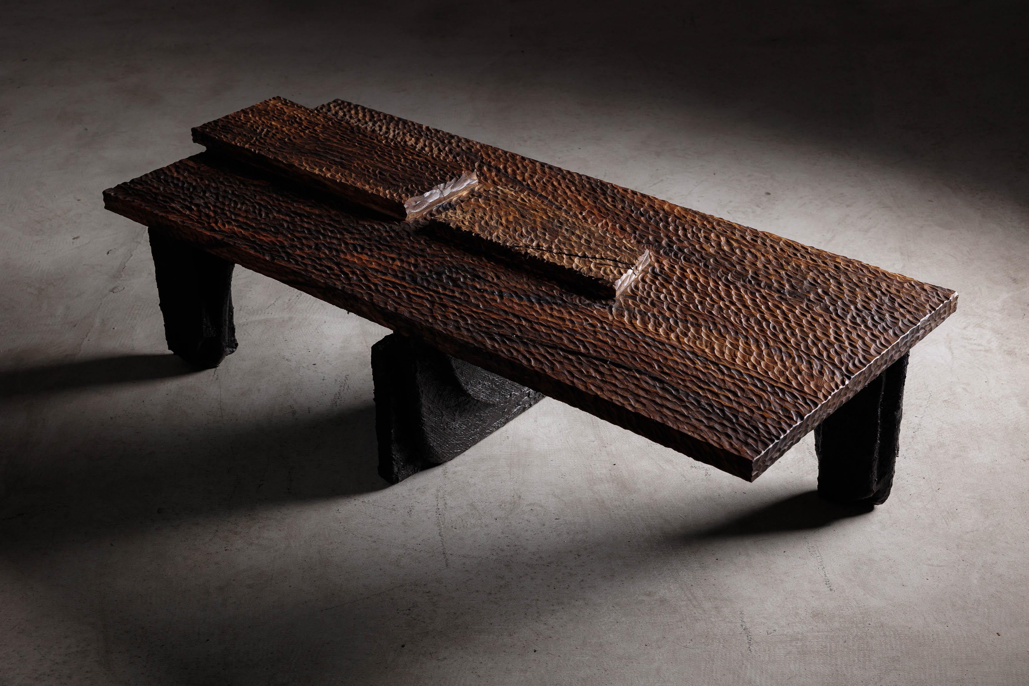 Introducing our stunning hand-carved walnut coffee table from Eero Moss Studio. Meticulously crafted with expert skill and precision, this table is a true work of art that will elevate any living space.

With its rich, warm tones and intricate