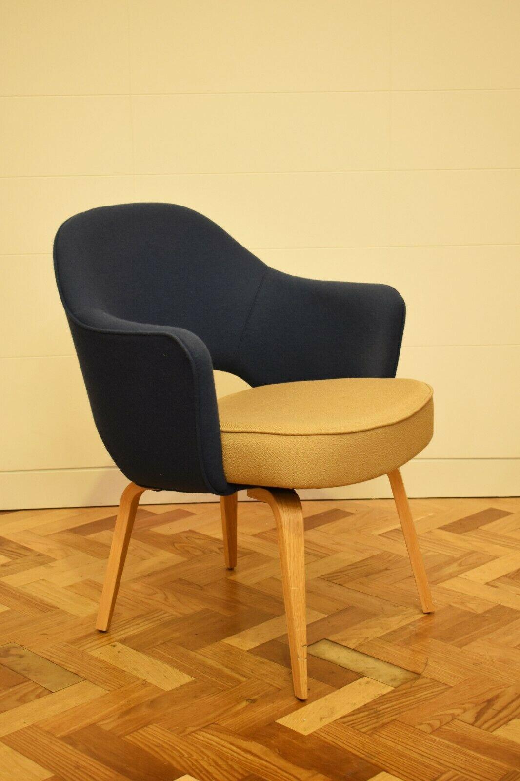 Contemporary edition of the Saarinen conference chair in navy and beige wool.

An iconic design by Eero Saarinen first introduced in 1957, this style of chair revolutionised the notion of what executive seating could be.

With simple