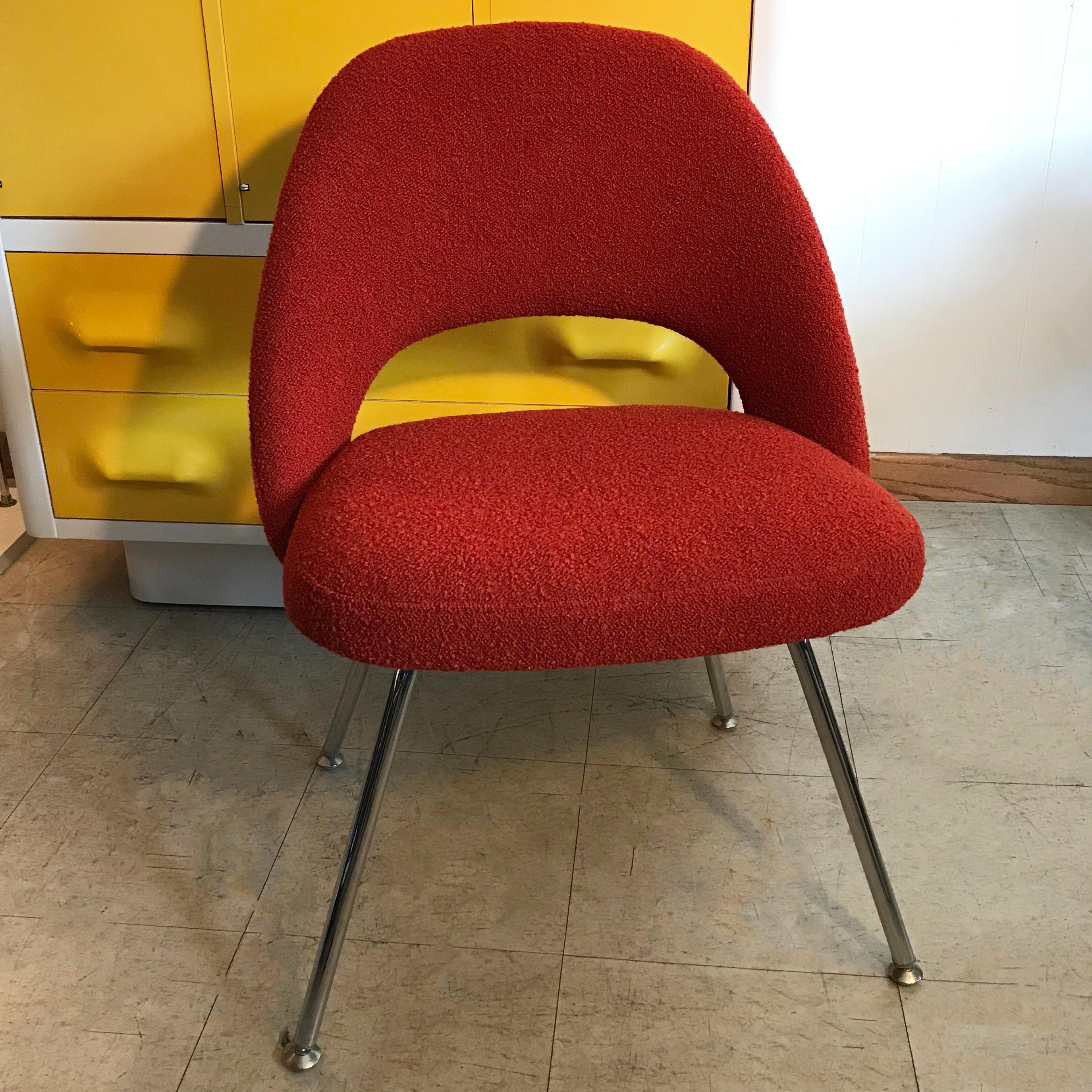 Mid-Century Modern, armless side chair by Eero Saarinen for Knoll features chrome legs with original glides and is newly upholstered in paprika red, nubby wool blend fabric.