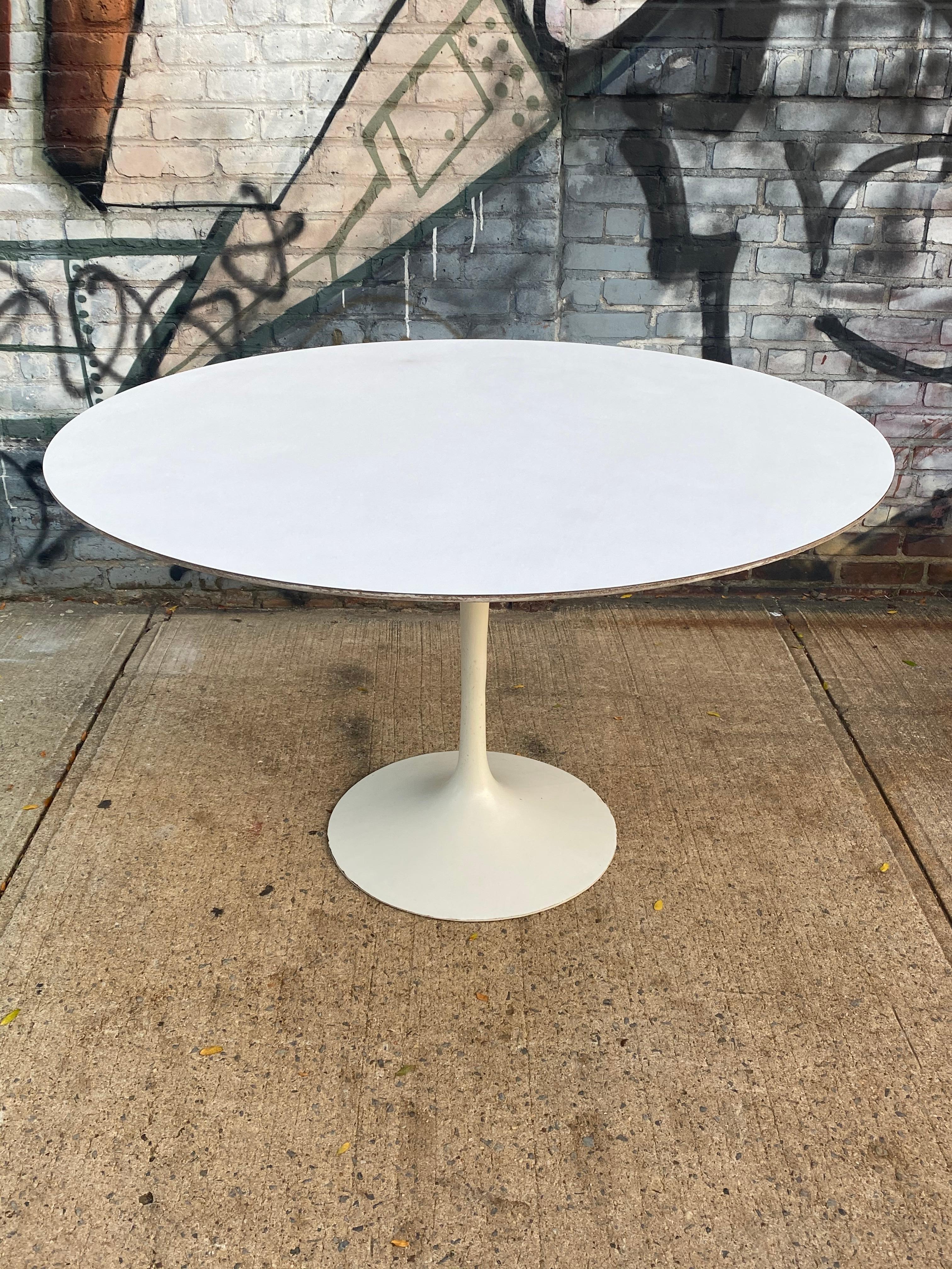 Eero Saarinen for Knoll 47 inch round tulip dining table. Signed with original Knoll tag and guaranteed authentic.