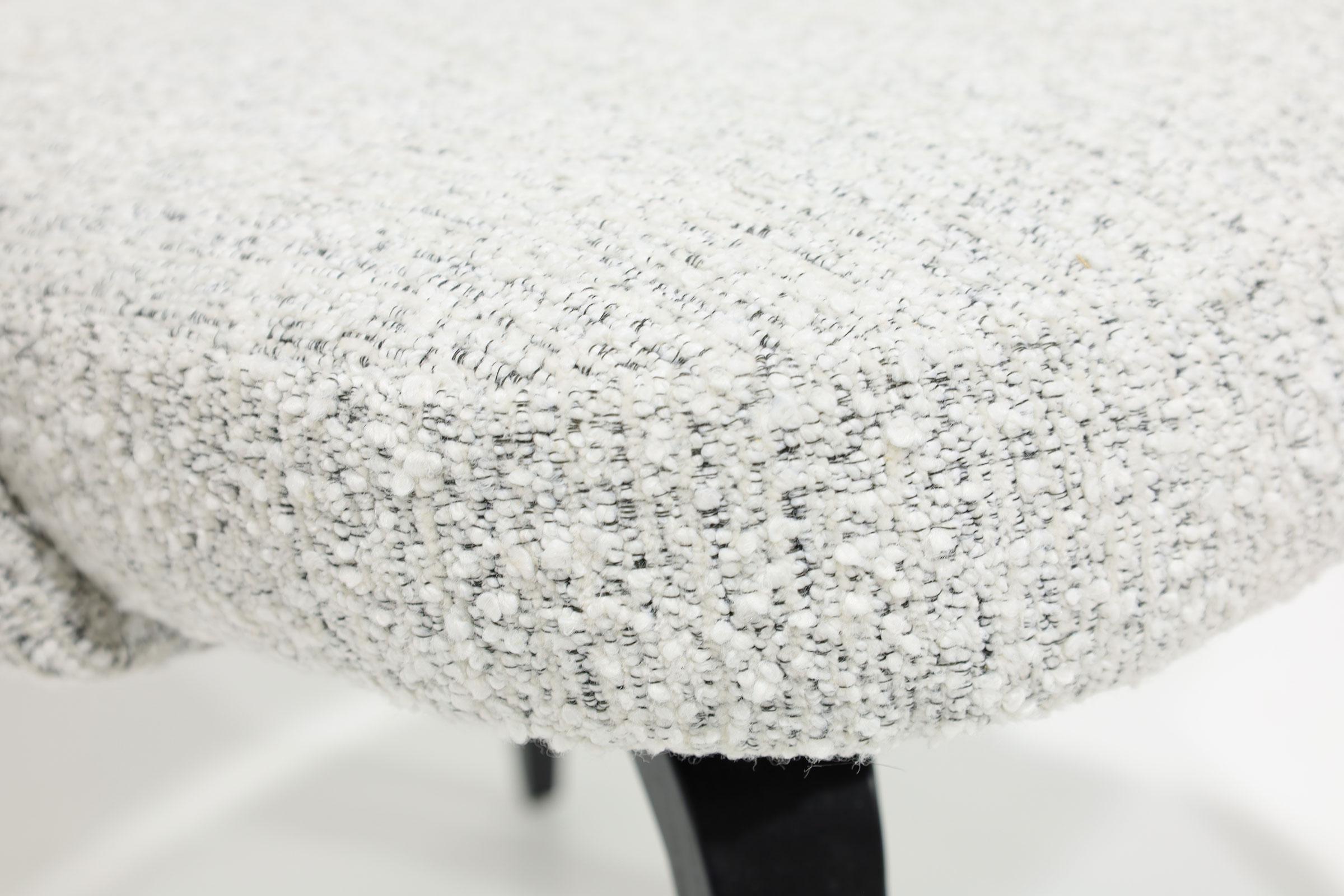 One of the greatest chairs ever designed, the Eero Saarinen for Knoll armless executive dining chair, adds a timeless elegance to any home. This iconic piece is not only comfortable and stylish but also fits any table gracefully and is easy to move