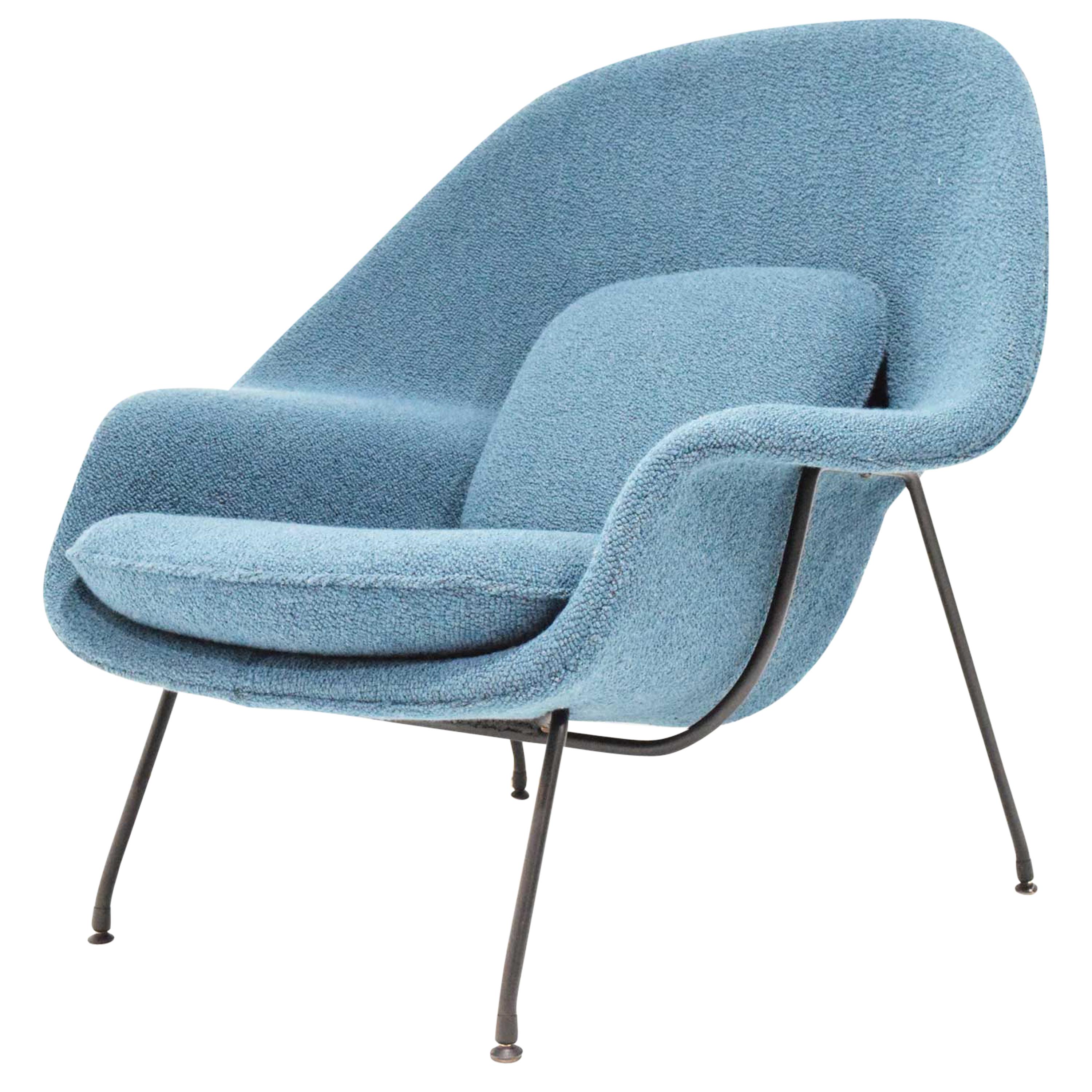 We have restored this 1961 Knoll Womb chair and added new upholstery by Larsen. Fabric is beautiful blue with a nubby pile.