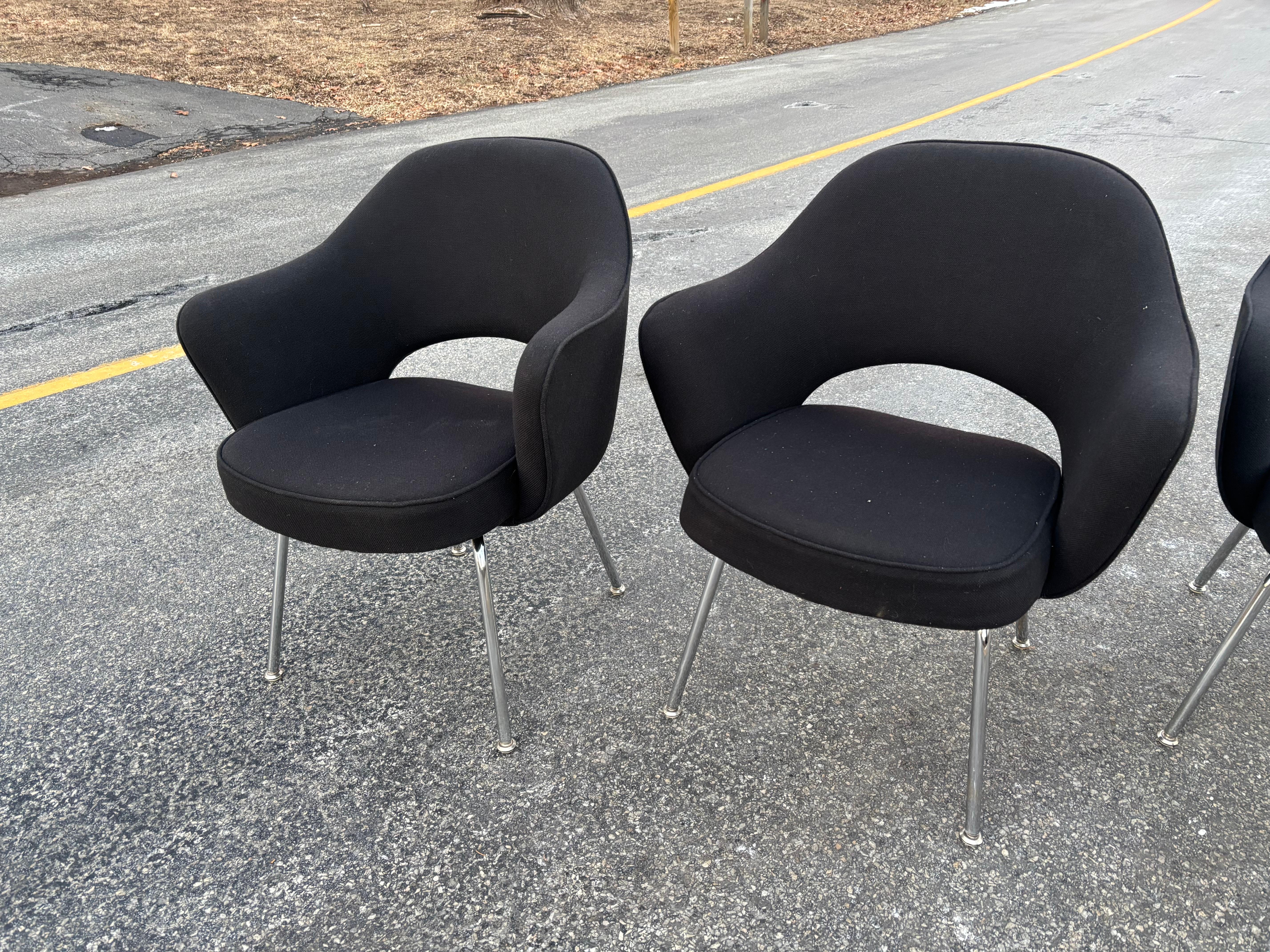 Eero Saarinen for Knoll Executive Armchairs, sold in sets of 4!  Two Sets of 4 Available!  Classic Comfortable large chair.  Perfect for dining rooms or conference!  These came from IBM, guessing from the late 1970's because they have reupholster
