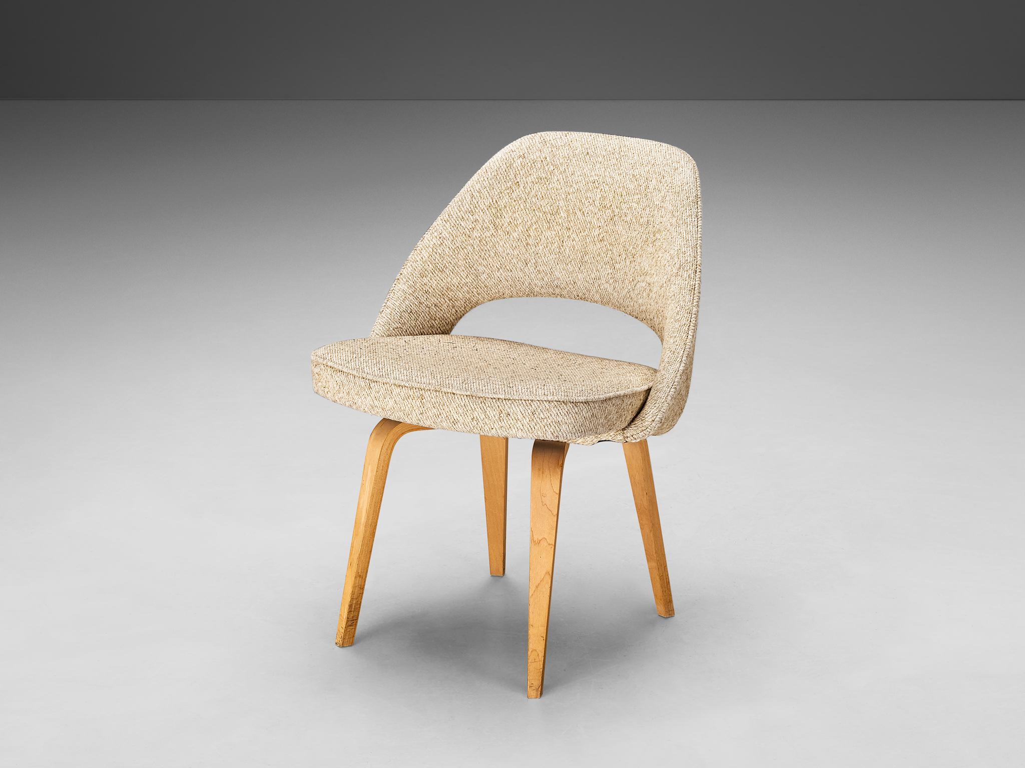 Eero Saarinen for Knoll International, dining chair, oak, fabric, United States, design 1948, later production

An organic shaped chair designed by Eero Saarinen. A fluid, sculptural form. This timeless and versatile design continues to fit