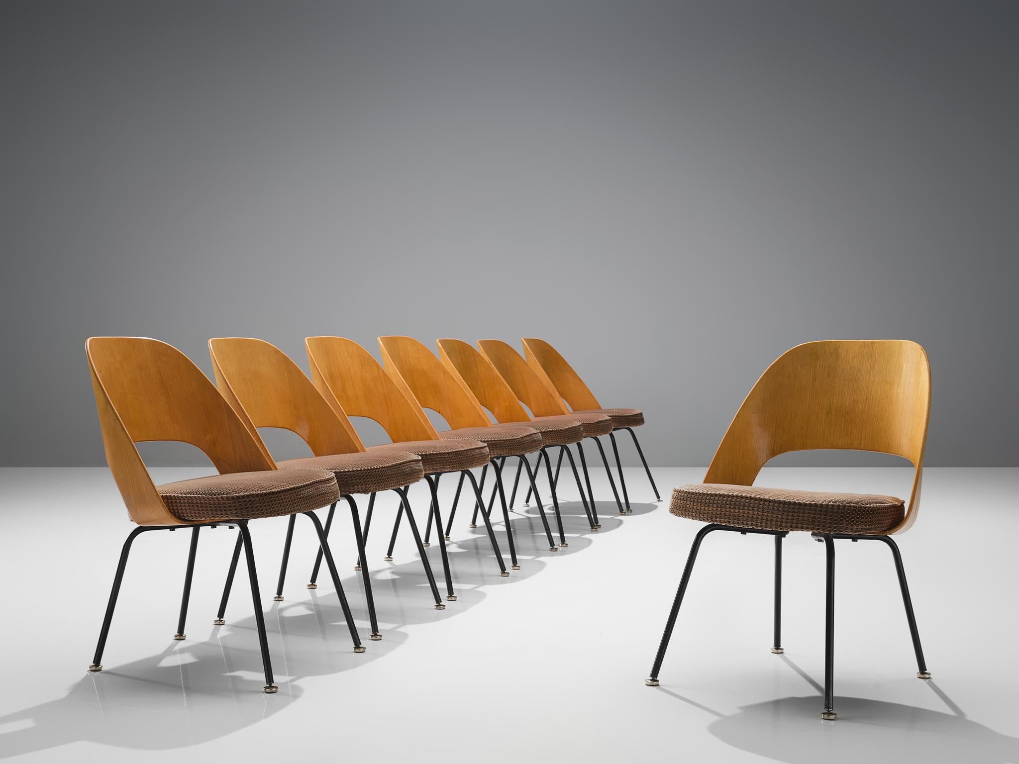 Eero Saarinen for Knoll International, set of 8 chairs model 72, in metal, wood fabric, United States, 1955. 

Eight organic shaped chairs designed by Eero Saarinen. This iconic model is features a plywood back and a seat with original brown, beige