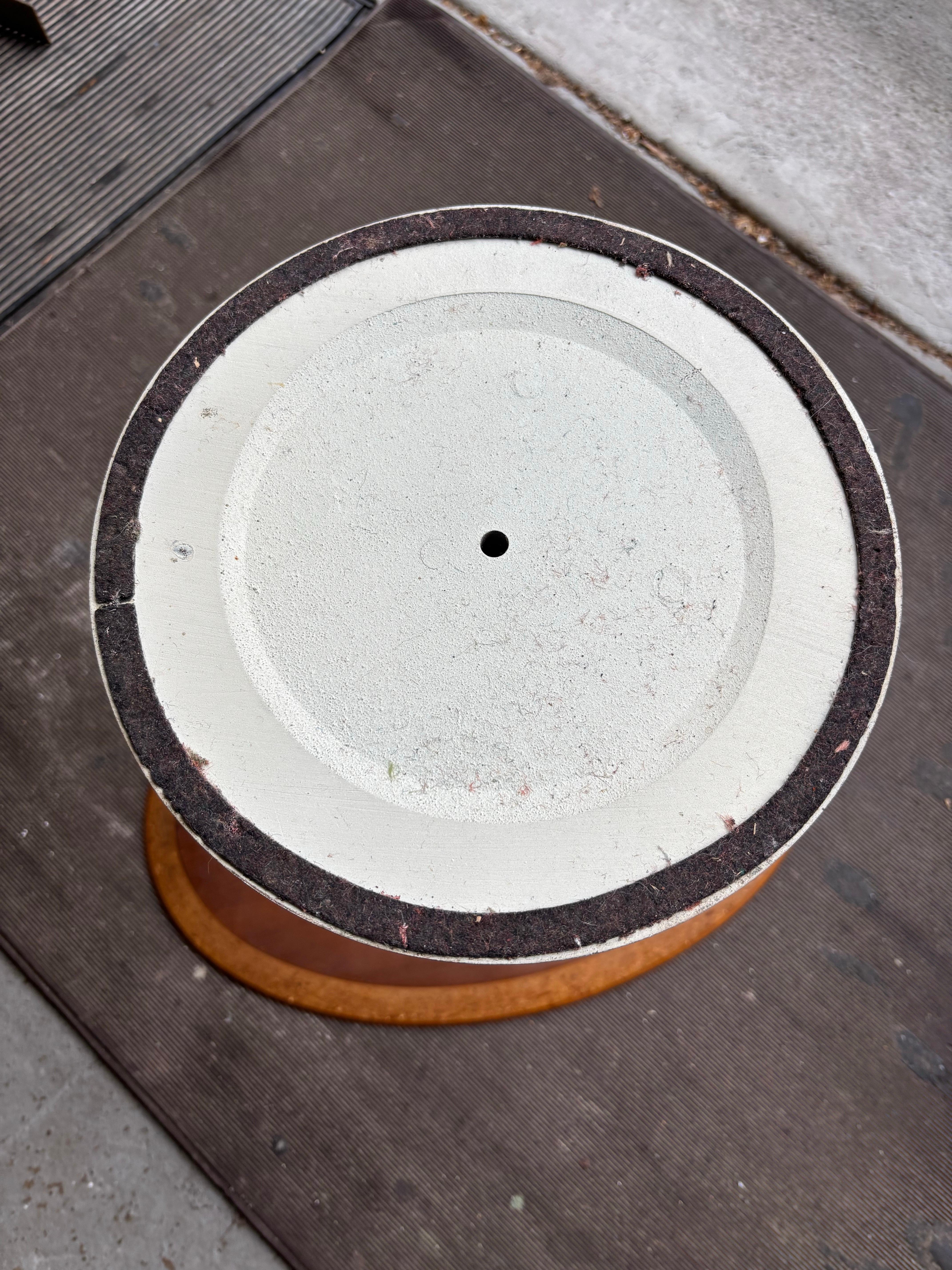 Nice early example of an Eero Saarinen for Knoll Tulip Oval Walnut Side Table.  Top has been refinished.  Retains early label to underside of top.  Iron Base is all original and shows a couple minor paint chips.  Overall a very nice example of a