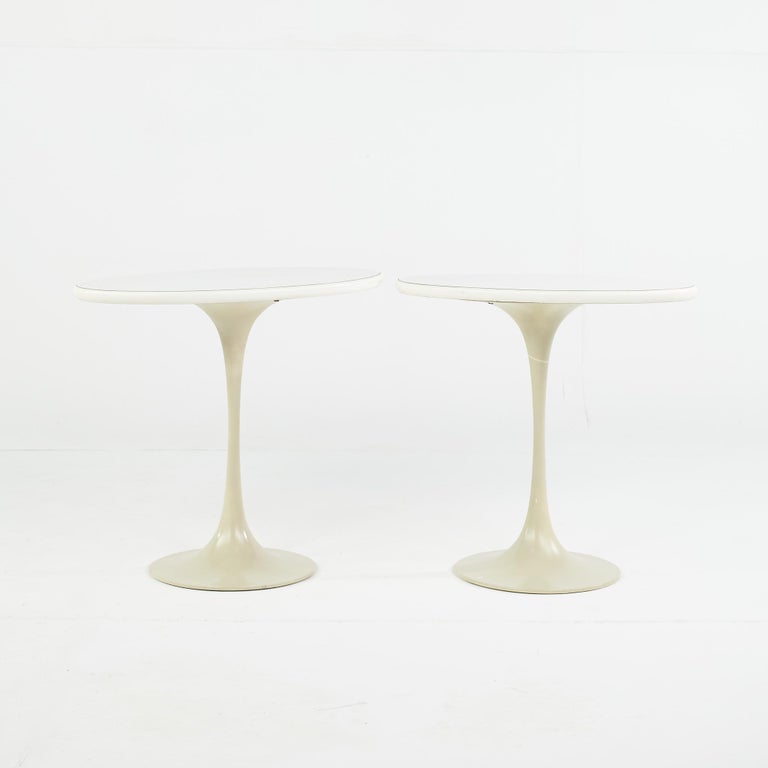 Eero Saarinen for Knoll style mid-century oval tulip tables - a pair

Each table measures: 23 wide x 15.25 deep x 20 inches high.

All pieces of furniture can be had in what we call restored vintage condition. That means the piece is restored
