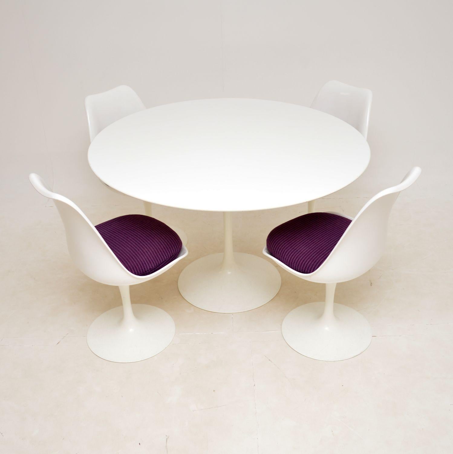 A stylish and iconic design, this tulip dining table and four matching swivel dining chairs were designed by Eero Saarinen for Knoll in the 1950’s.

This example is from the 50th anniversary edition, made by Knoll and dating from the early 2000’s.