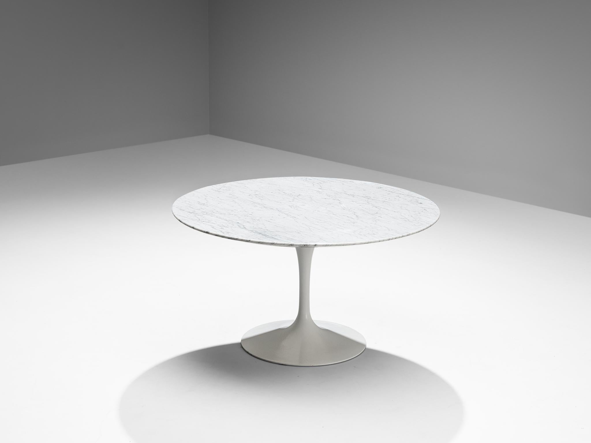 Eero Saarinen for Knoll International, dining table, metal, marble, United States, 1958.

This iconic pedestal table from the Tulip collection is designed by Eero Saarinen in the 1950s and it took him five years to arrive at this exact design.