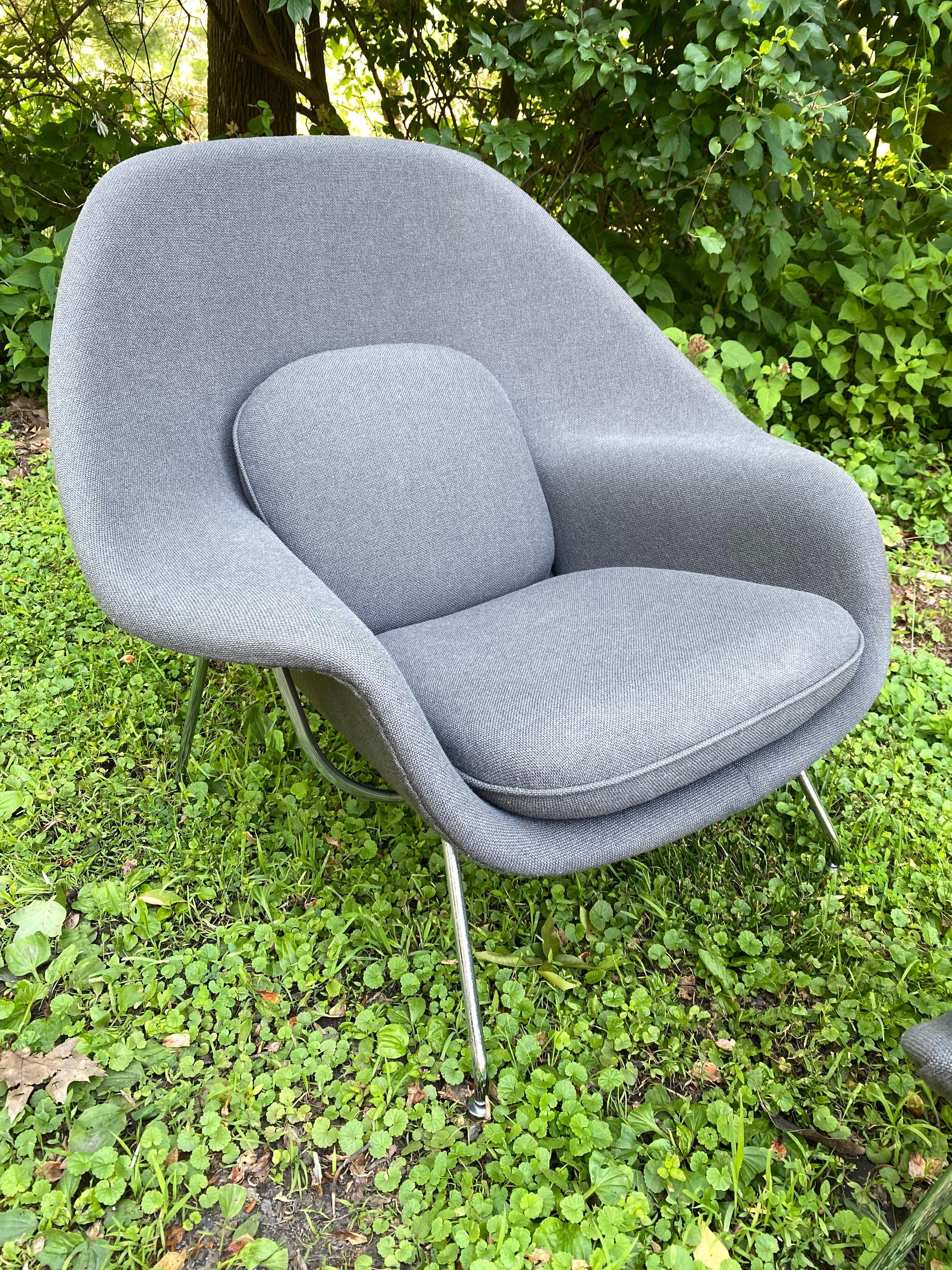Eero Saarinen for knoll womb chair and ottoman reupholstered about 10 years ago in a medium gray fabric. Still looks very good and crazy comfortable! Chrome shows some wear as seen in photos, but really only noticeable when very close! Retains