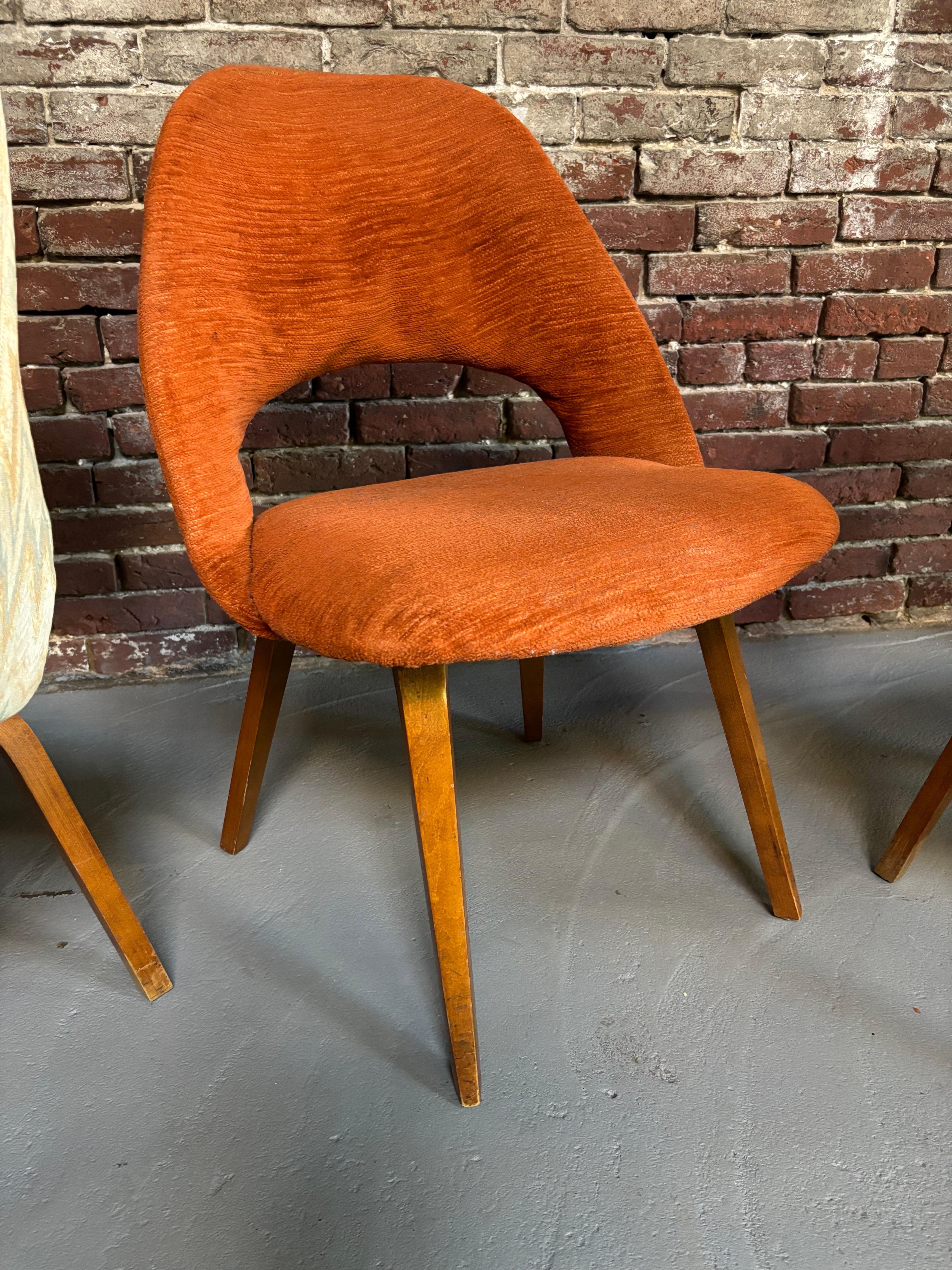 Eero Saarinen for Knoll Executive Armless Chairs with wood legs.  Chairs are solid but needing new upholstery and wood refinishing to legs.  Upholstery Services available, 275 plus fabric per chair!  My upholsterer does a great job on these chairs! 