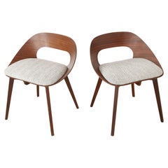 Eero saarinen in the style set of two chairs mid fifties