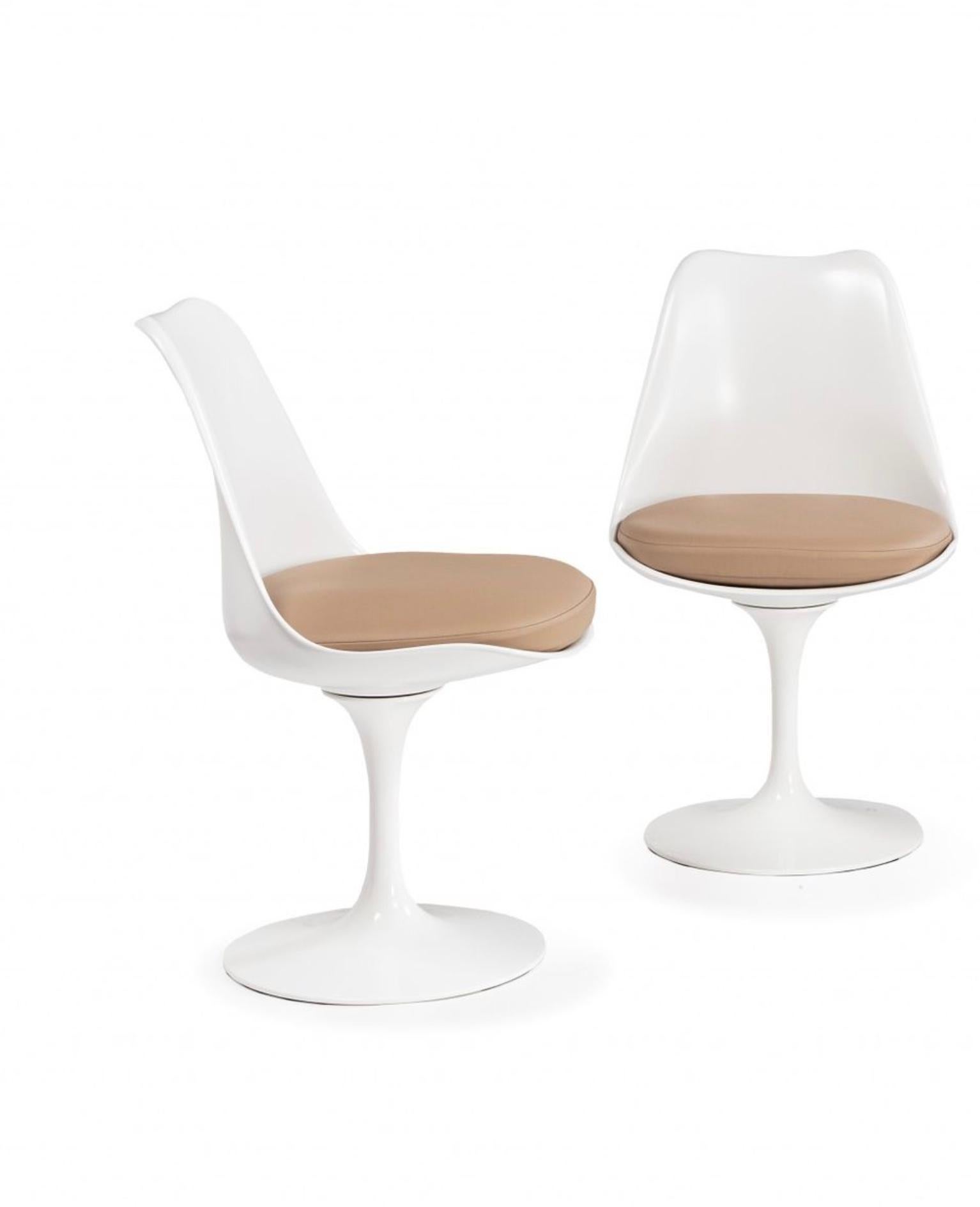 Eero Saarinen (1910-1961) & Knoll International (signed)

Suite of 4 Tulip model chairs
White lacquered fiberglass shell, swivel base in cast aluminum covered with white Rilsan.
beige leather seats cushions.
Dimensions: 31.89 x 20.08 x 17.33