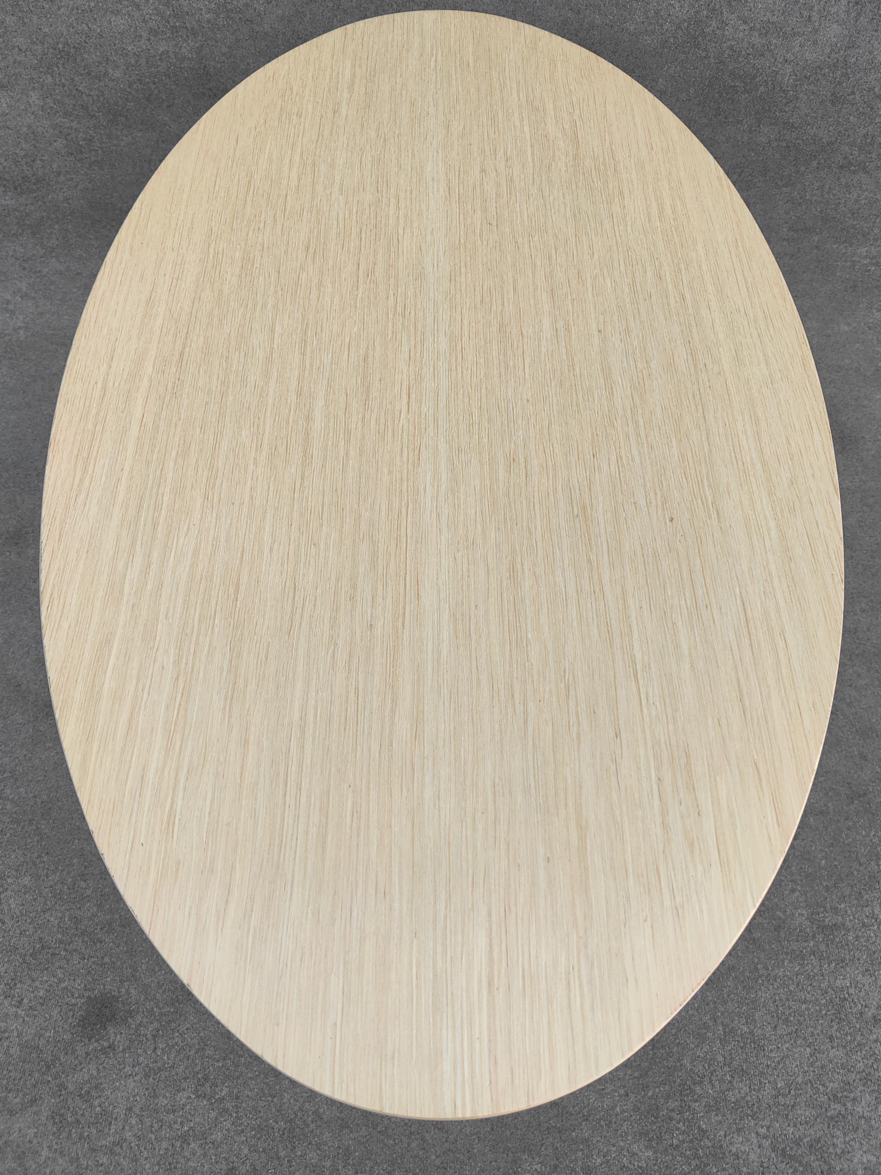 Américain Table de salle à manger Tulipe ovale Eero Saarinen Knoll 66x38 po. avec plateau en bois blond et base noire en vente