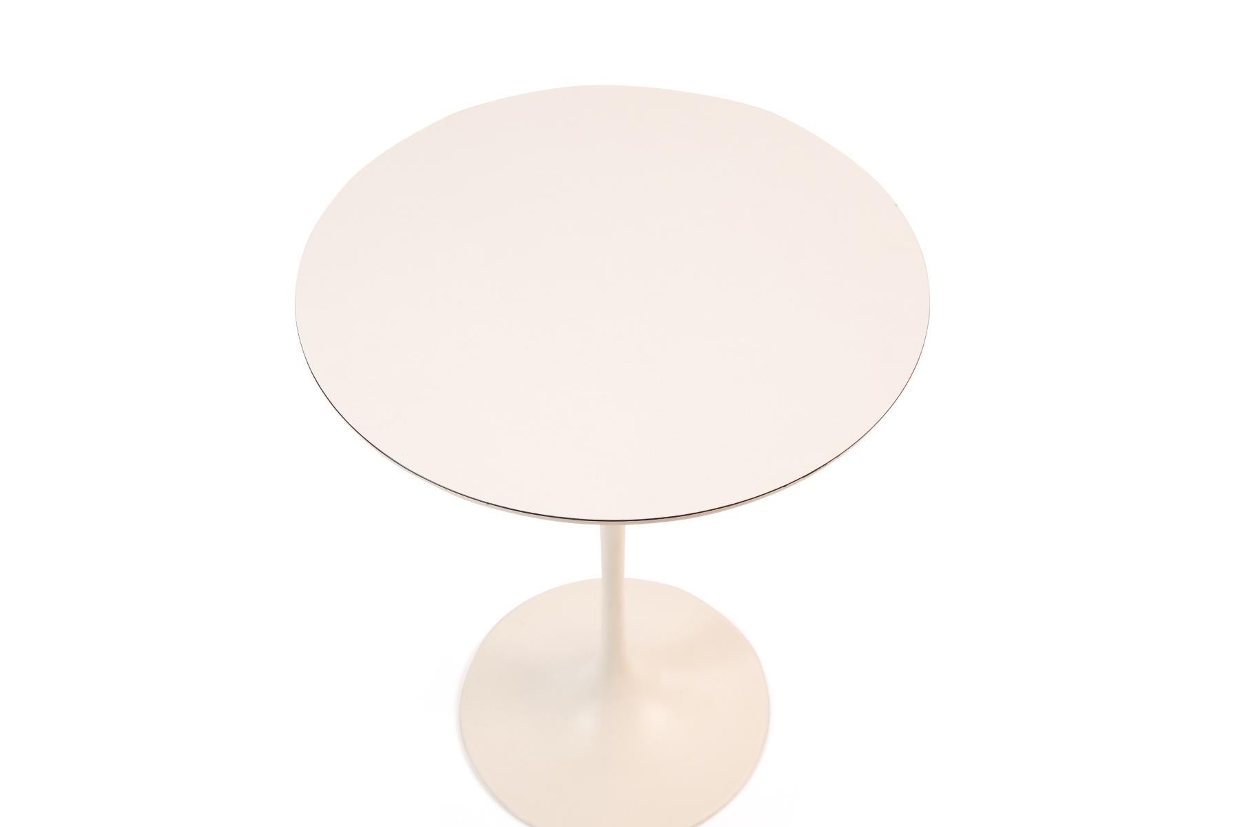 Tulip table with cast iron base and formica top by Eero Saarinen for Knoll.